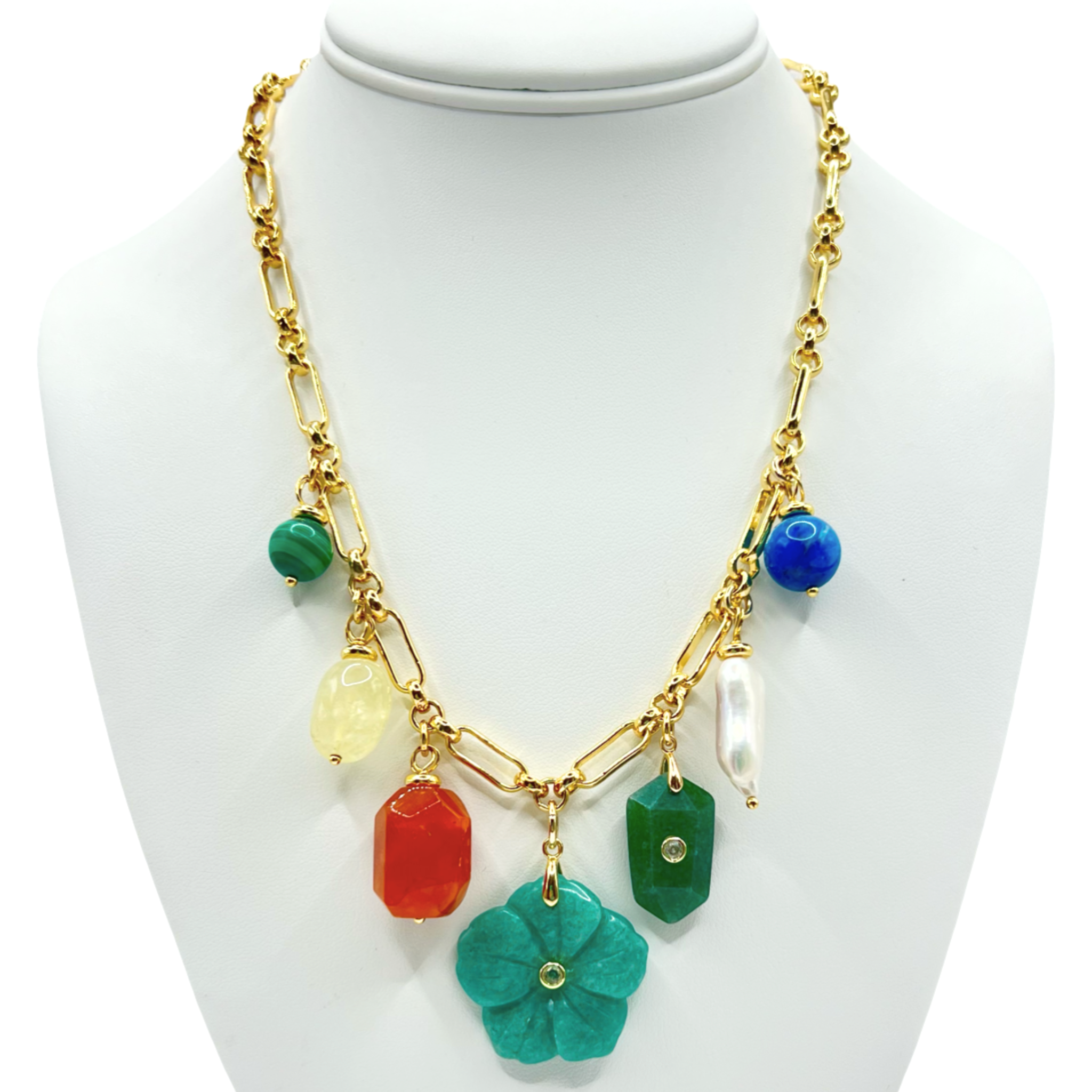 Gold thick link chain necklace with semi-precious gemstone and pearl charm pendants including malachite, carnelian, and jade flower by HOLST+LEE
