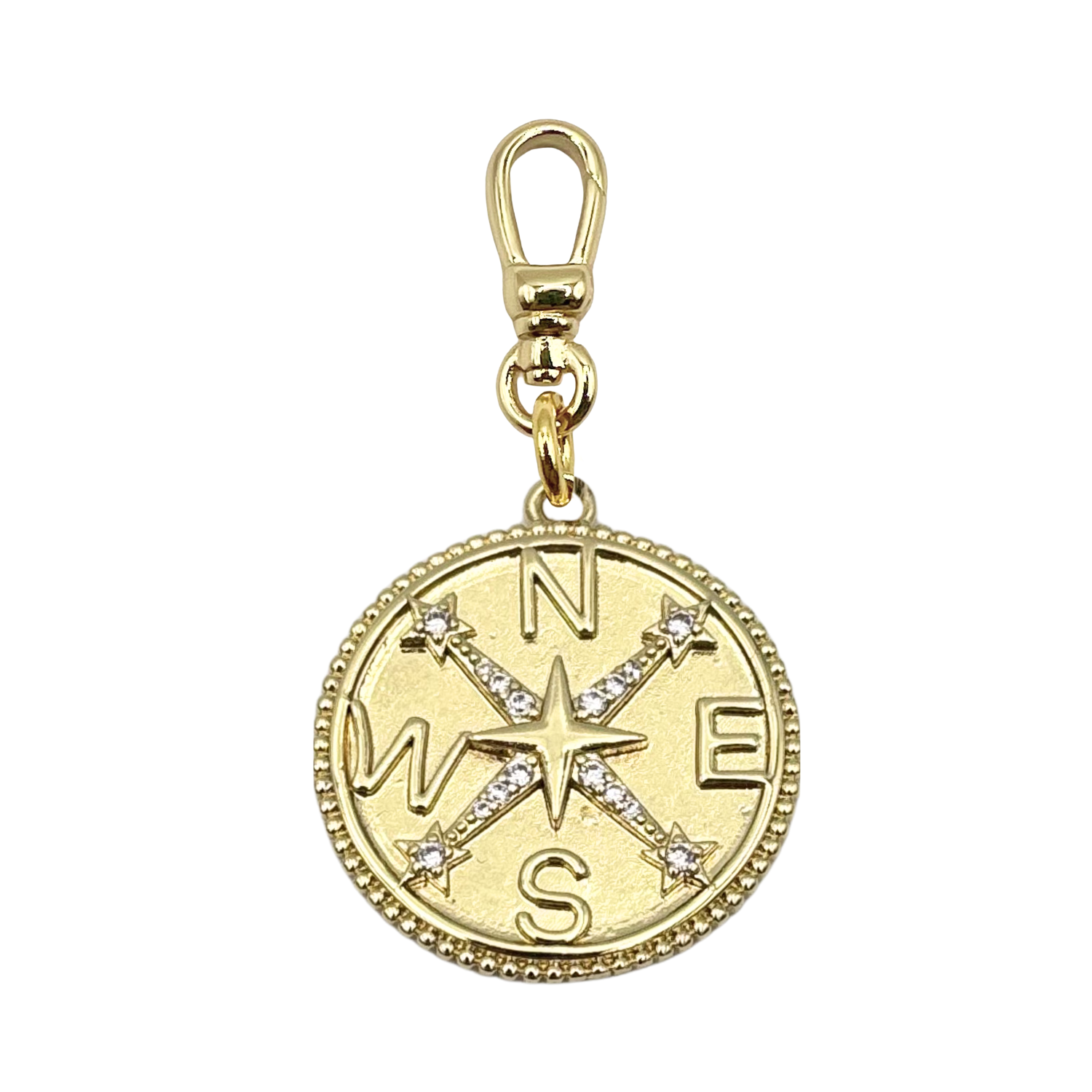 Gold compass charm with diamond star points, cardinal directions, with charm clasp by HOLST+LEE