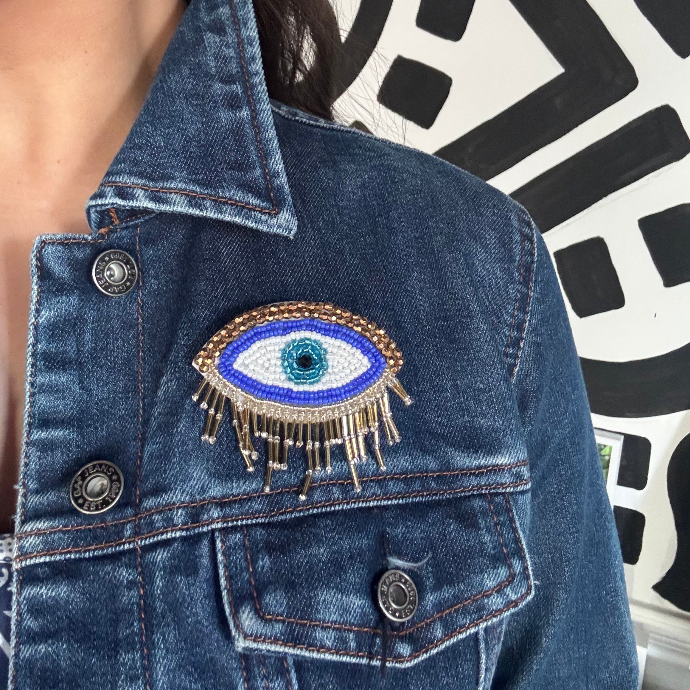 Gold Tassel Evil Eye Brooch