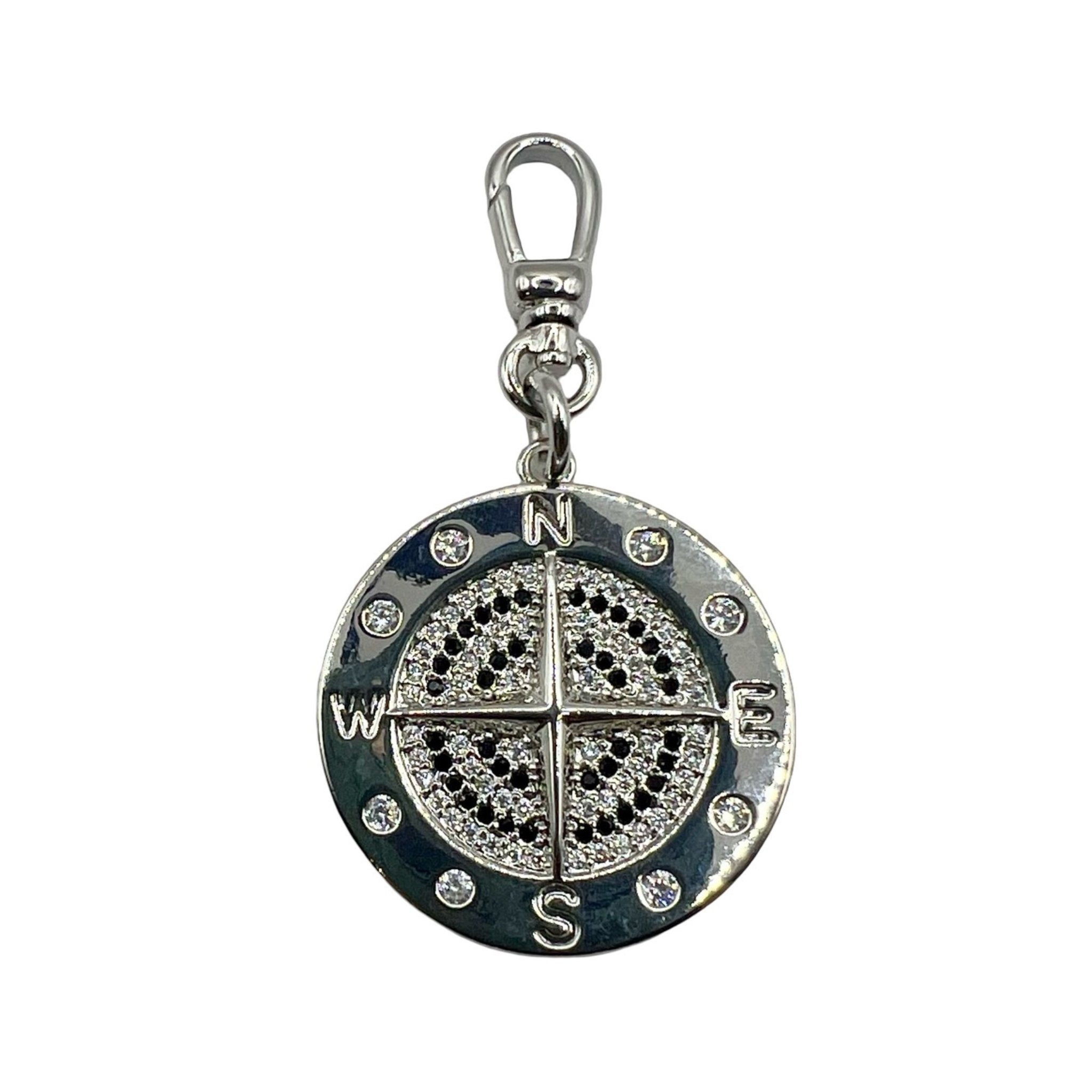 Silver compass charm with pavé black and white diamonds, cardinal directions, and silver charm clip by HOLST+LEE