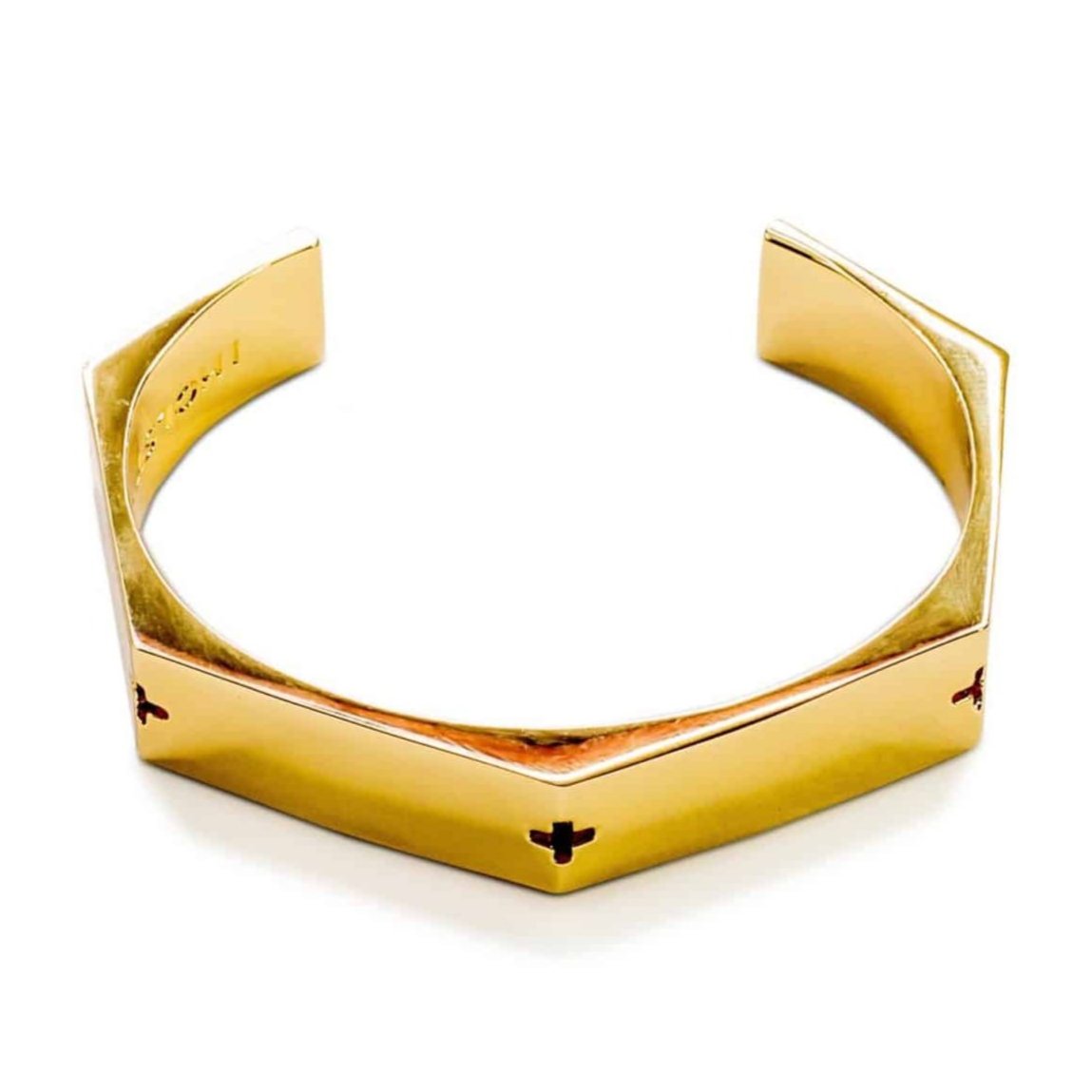 Gold metal cuff bracelet with small engraved crosses on the sides by HOLST+LEE