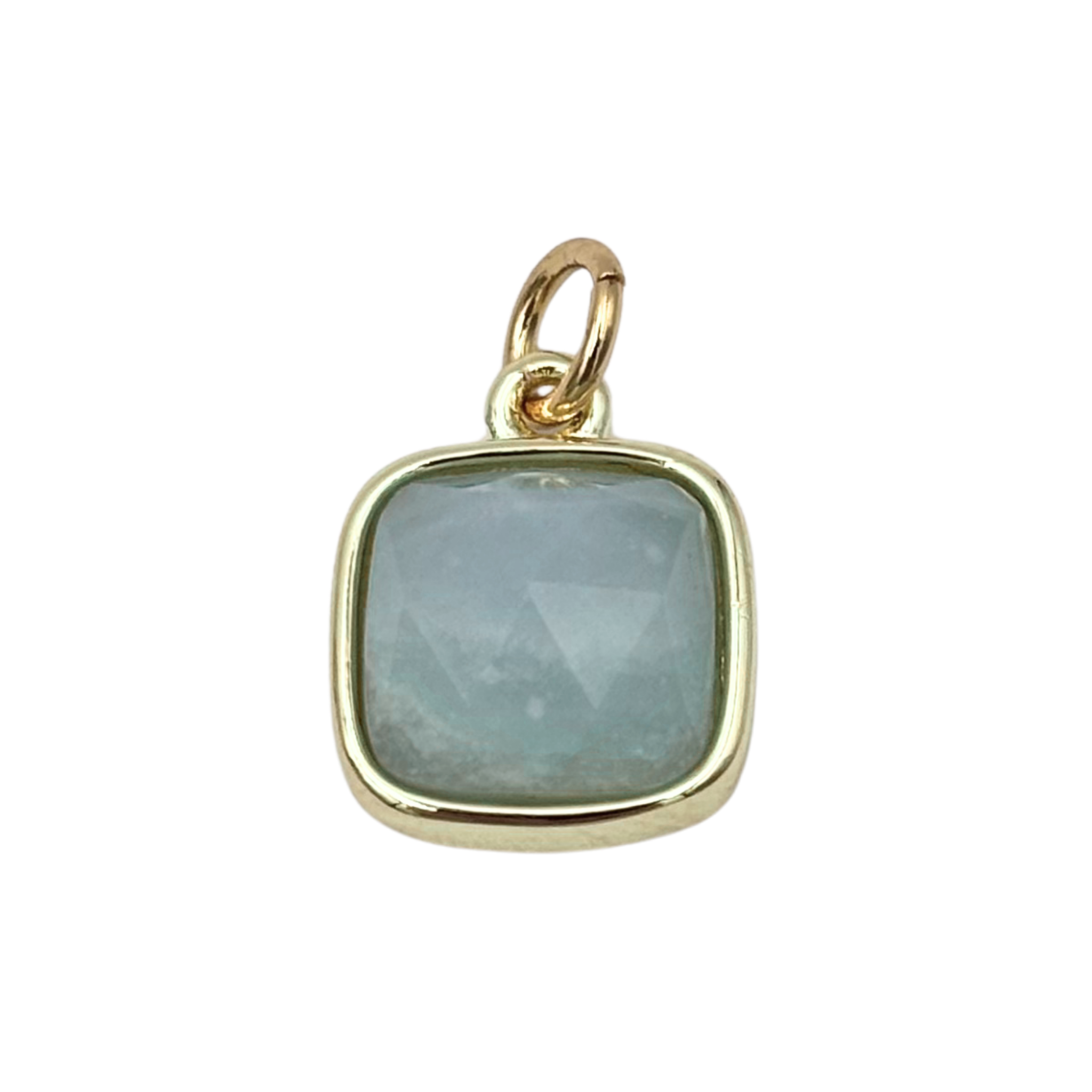Gold cushion-bezel pendant with faceted aquamarine stone by HOLST+LEE