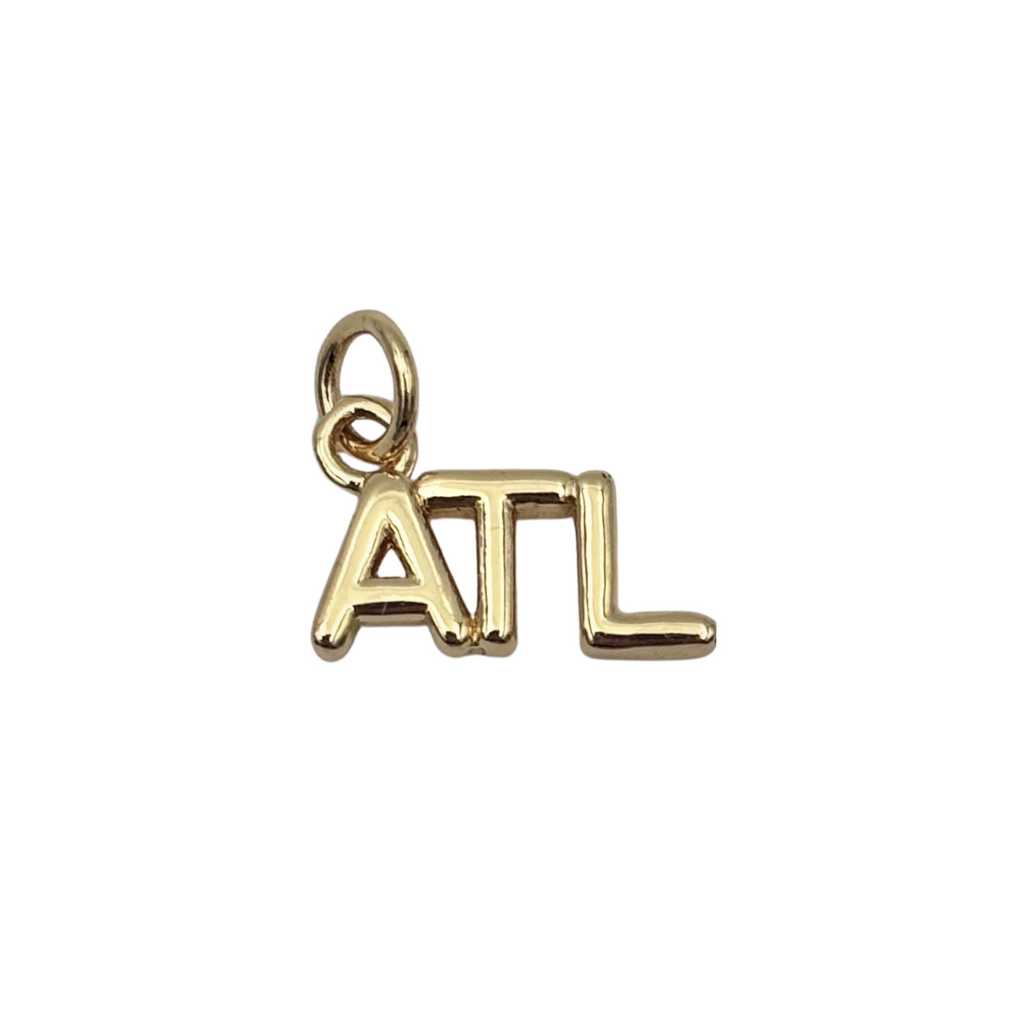 Gold 'ATL' charm with sleek finish by HOLST+LEE