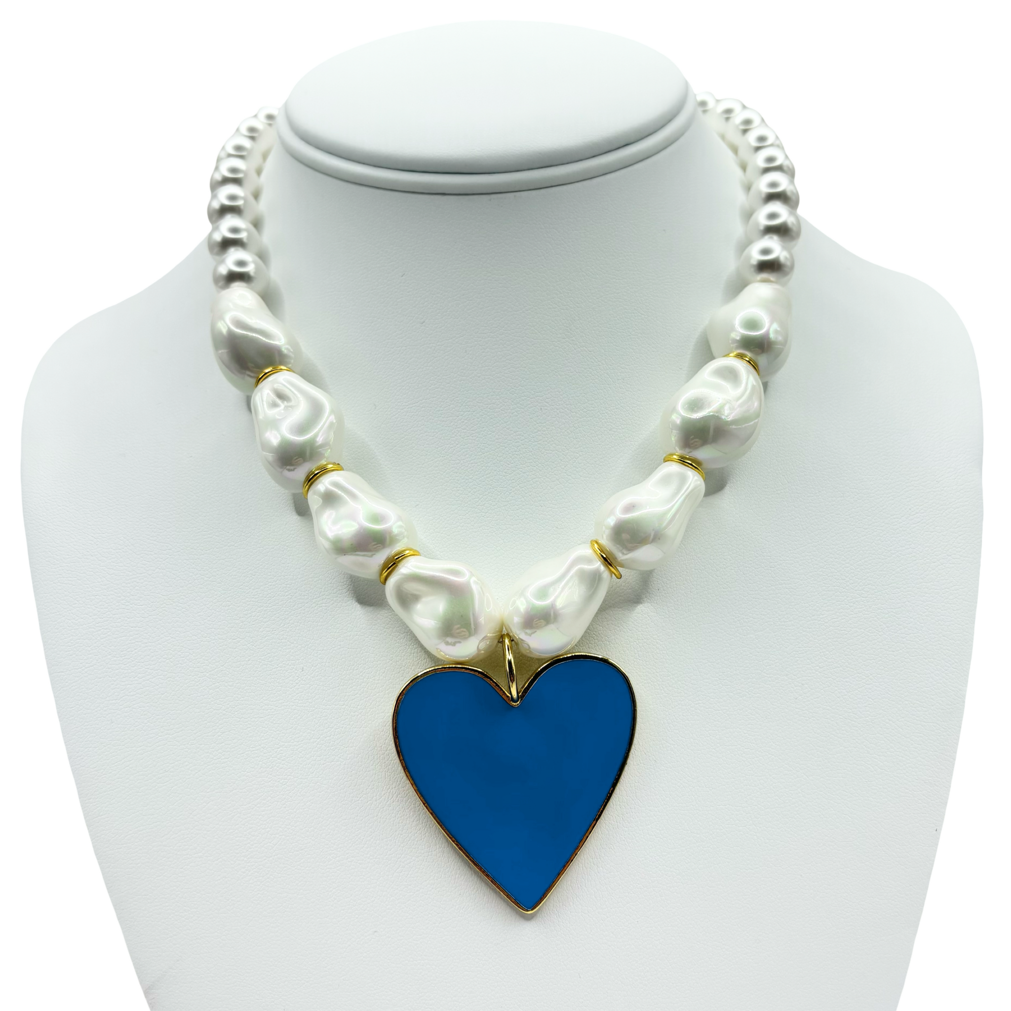 Faux pearl necklace with a blue heart pendant with gold accents by HOLST+LEE