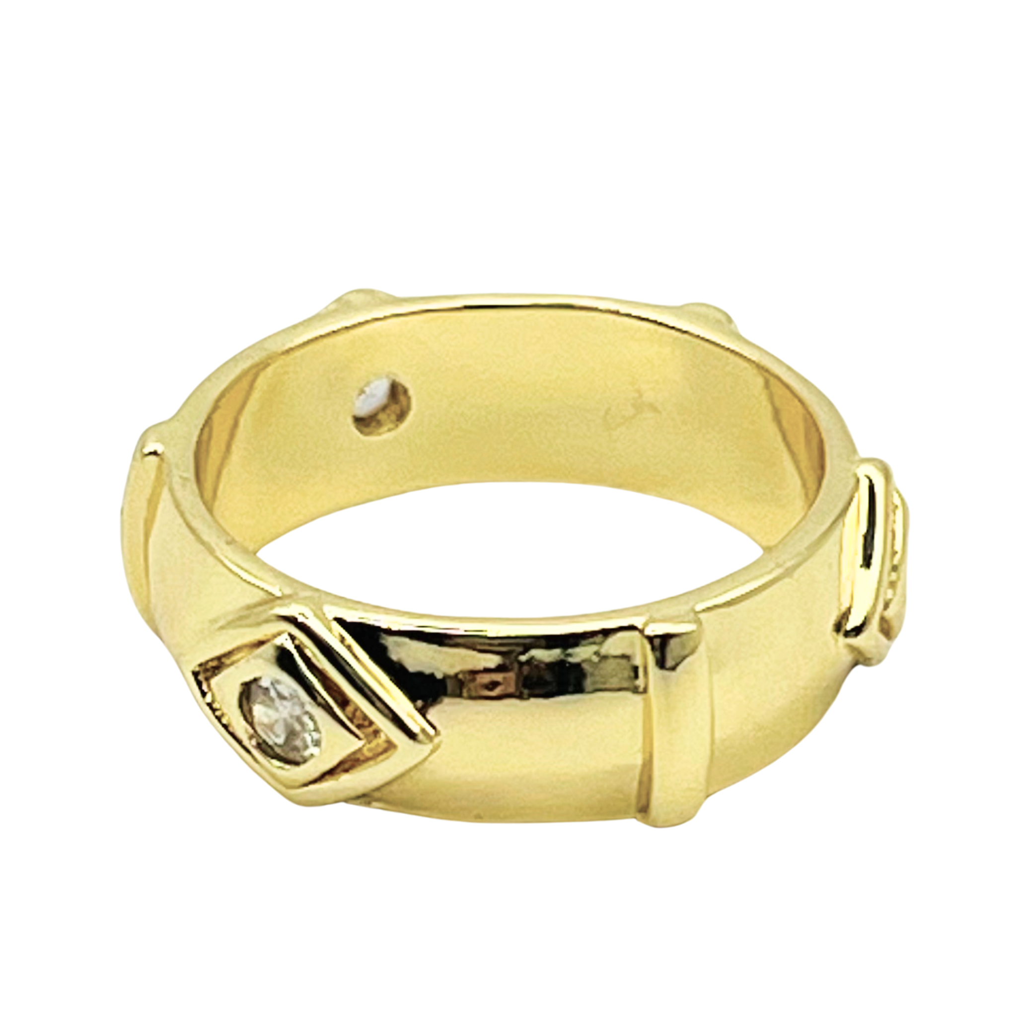 Gold ring with evil eye designs with embedded stones as pupils by HOLST+LEE