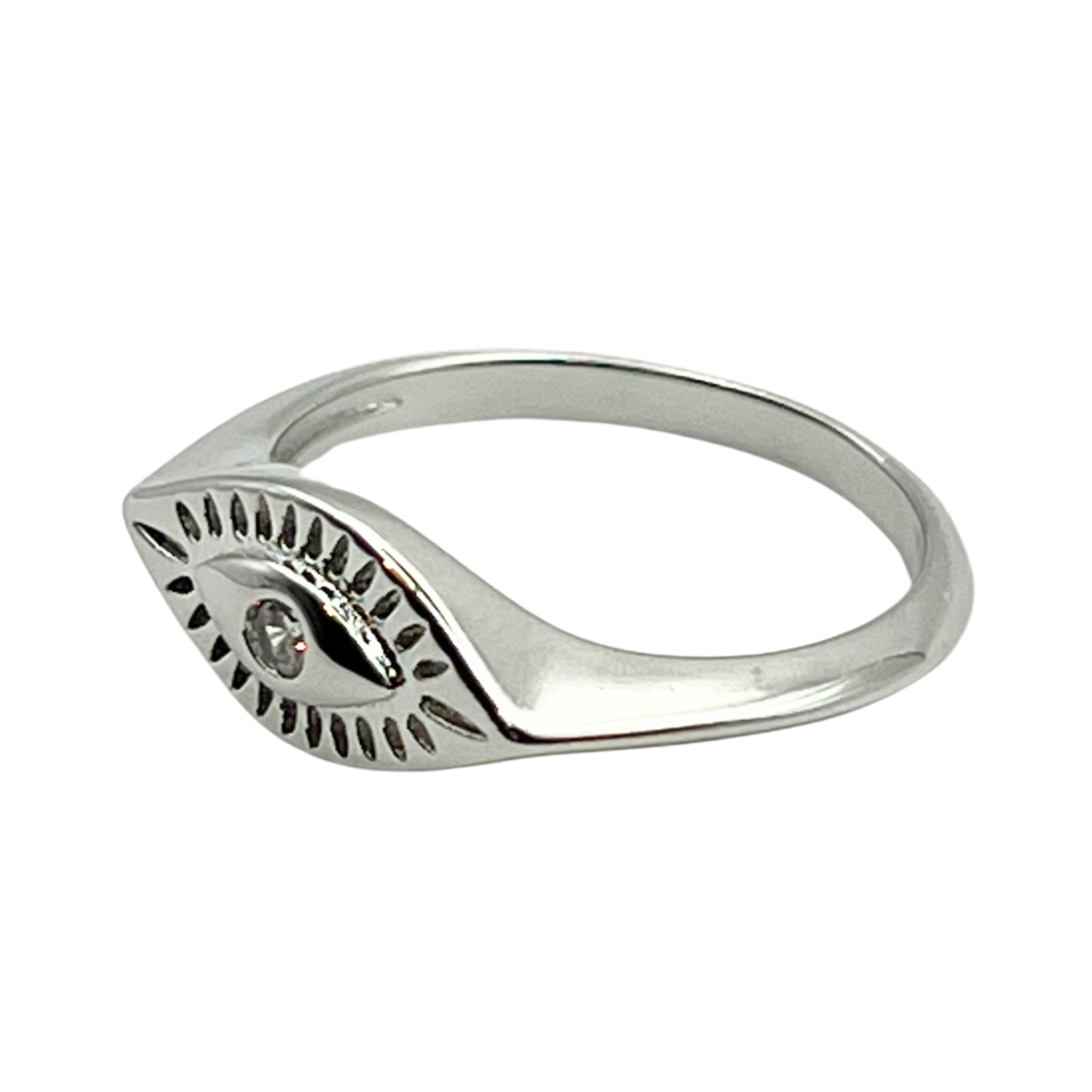 Silver ring with a design resembling an eye, featuring a rhinestone as the pupil by HOLST+LEE