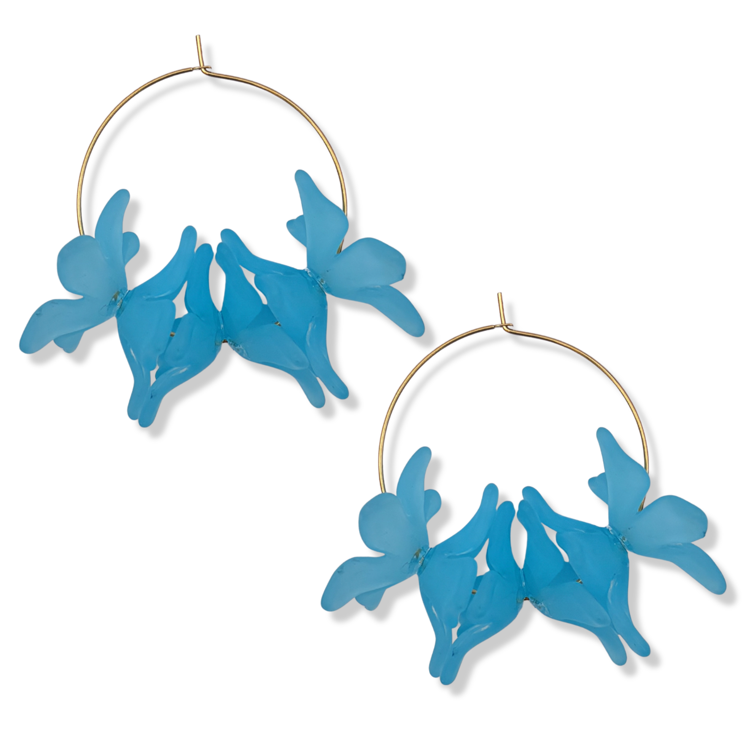 Ocean blue resin floral cluster hoop earrings with translucent blue orchid-style blooms on a thin gold hoop by HOLST+LEE