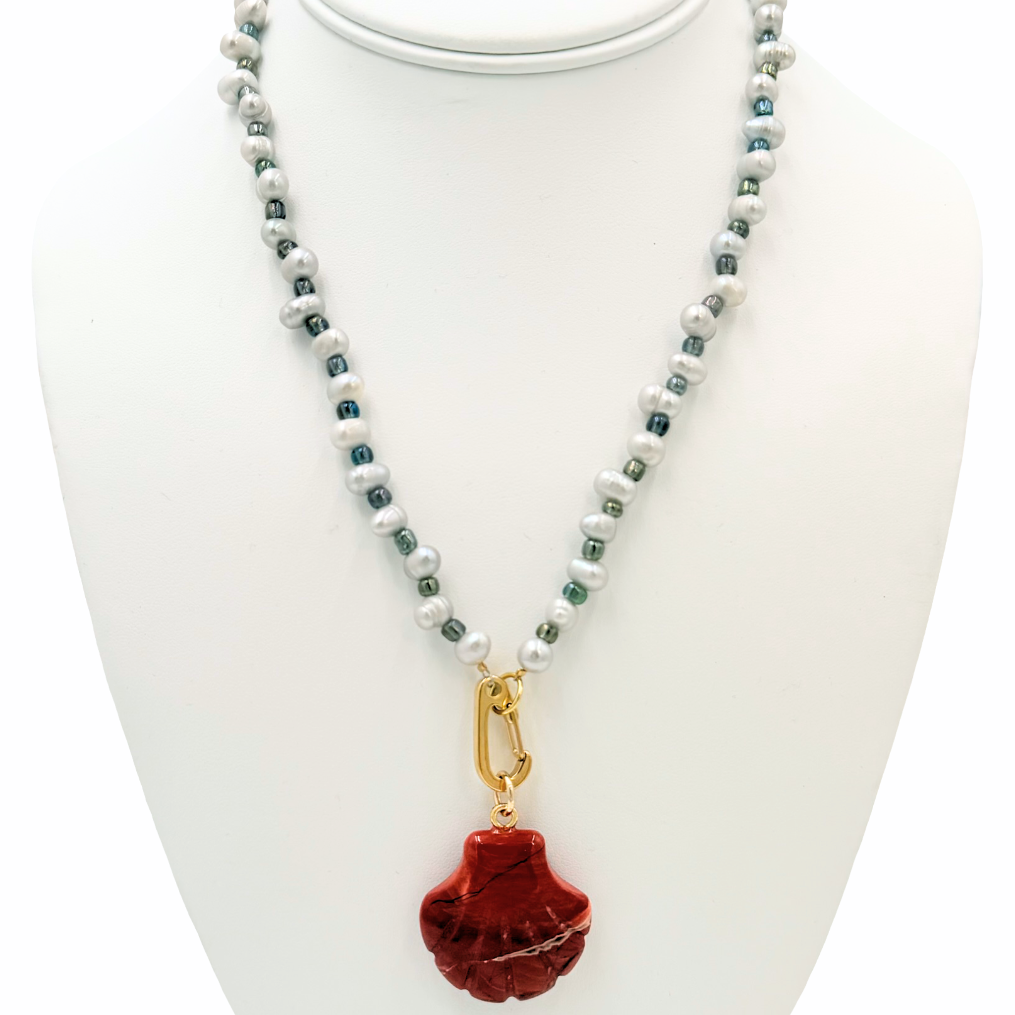 Freshwater pearl necklace with small bead embellishments featuring a semi-precious shell pendant by HOLST+LEE