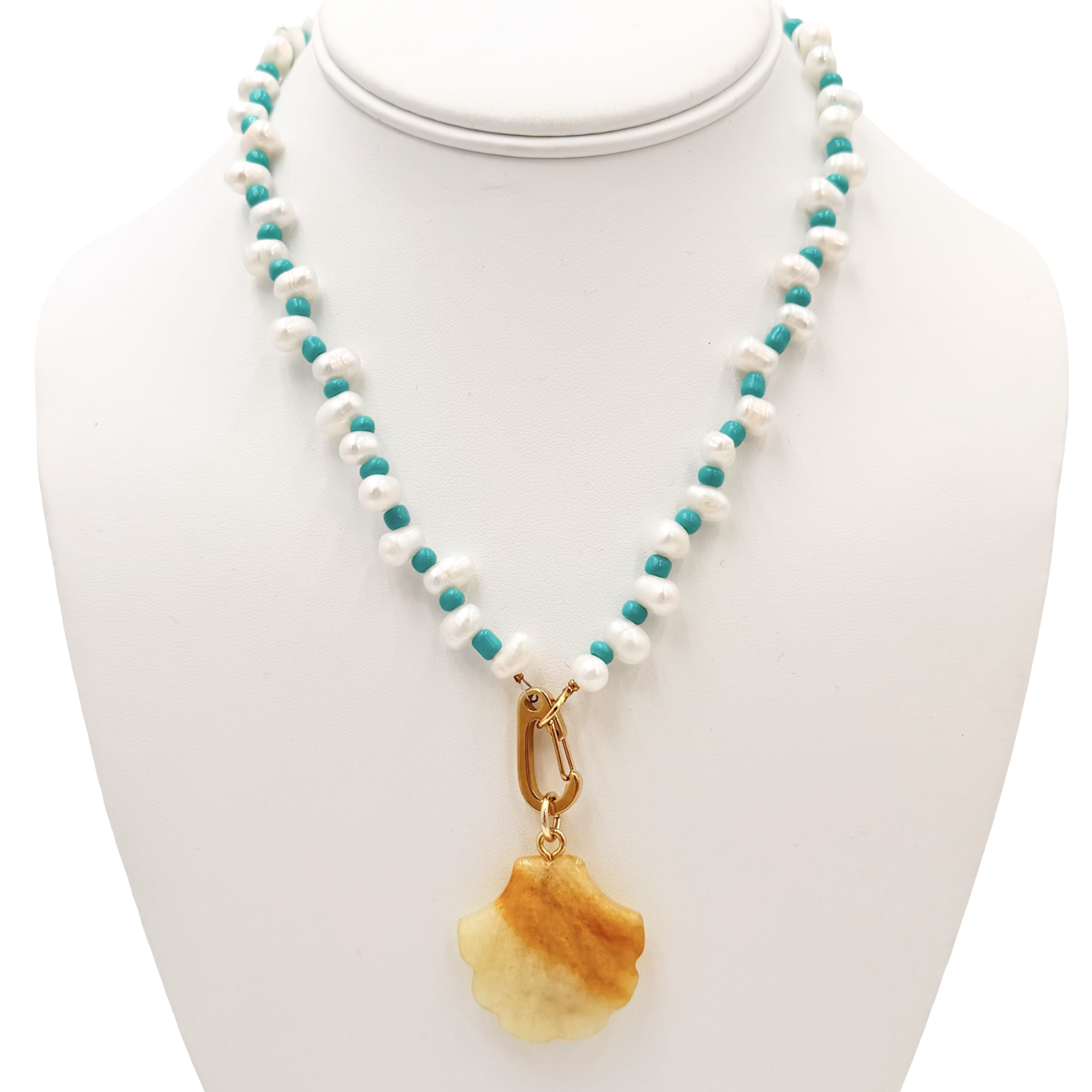 Freshwater pearl necklace with small turquoise bead embellishments featuring a semi-precious shell pendant by HOLST+LEE