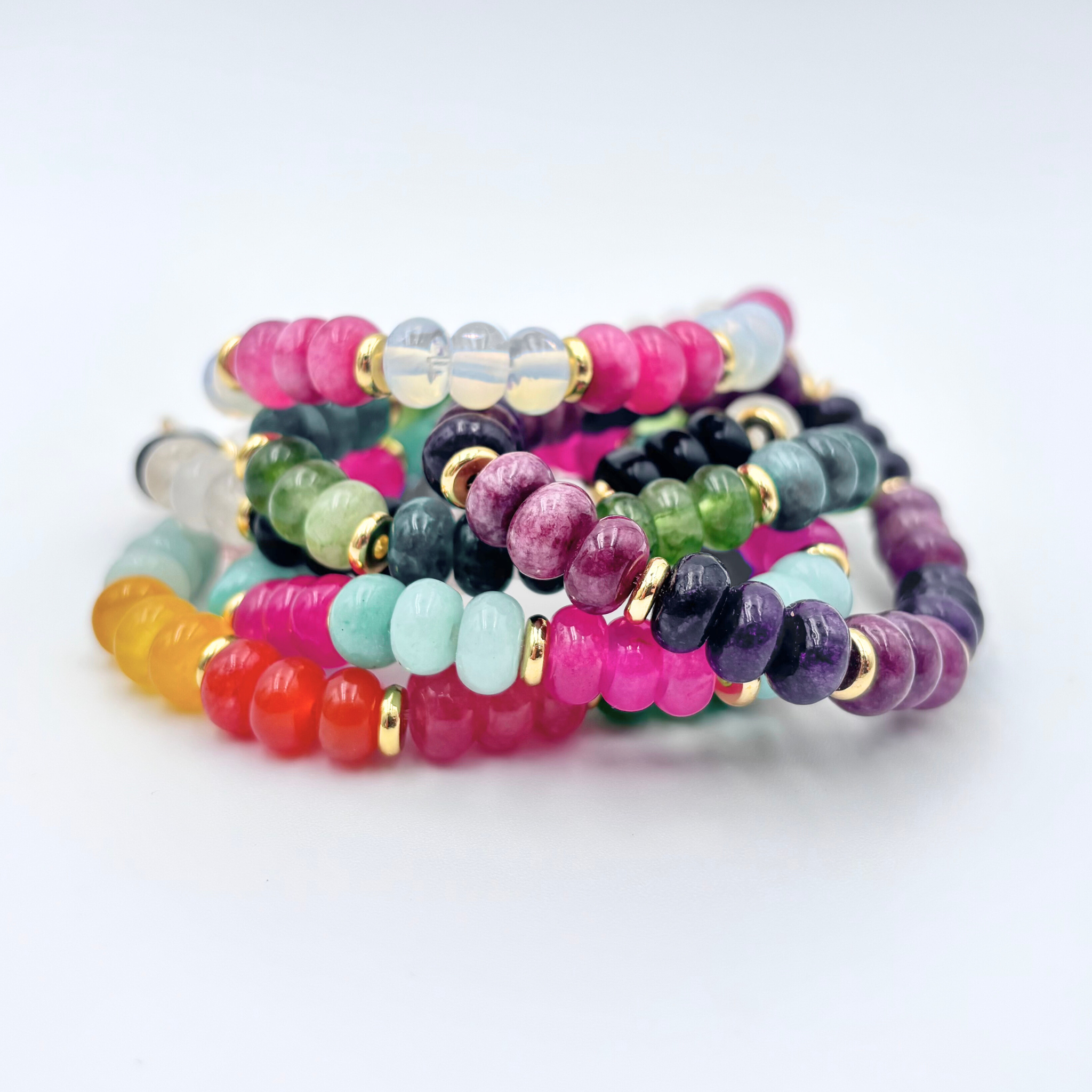 Stacked multicolor gemstone beaded bracelets with gold accents by HOLST+LEE