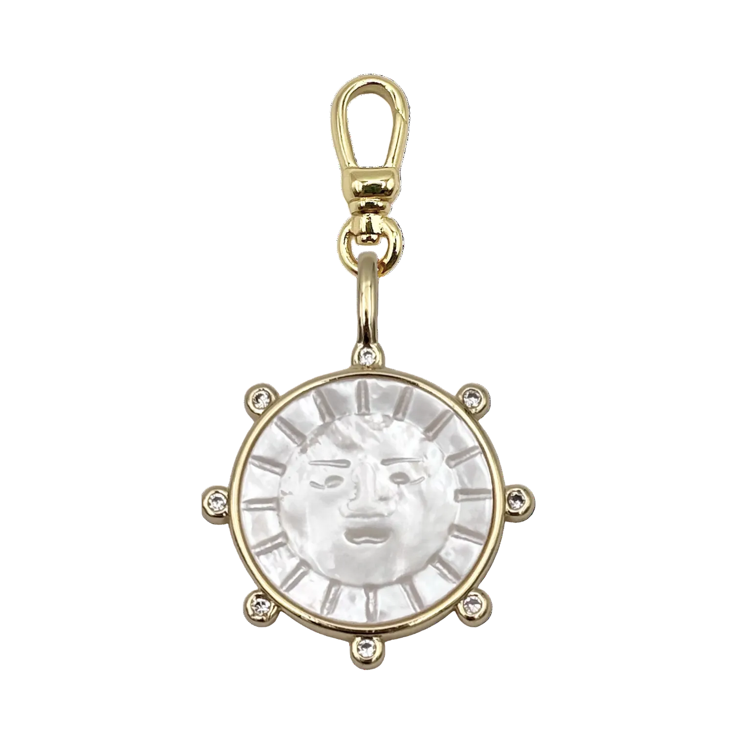 Circular mother-of-pearl sun face charm in a gold bezel setting with six diamond accents, with a charm clip by HOLST+LEE