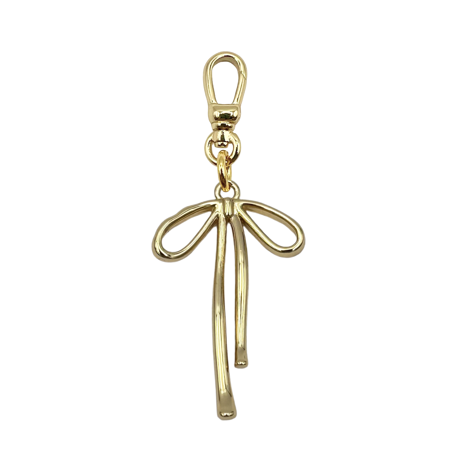 Gold bow charm with open loop design and long trailing ribbons with gold charm clip by HOLST+LEE