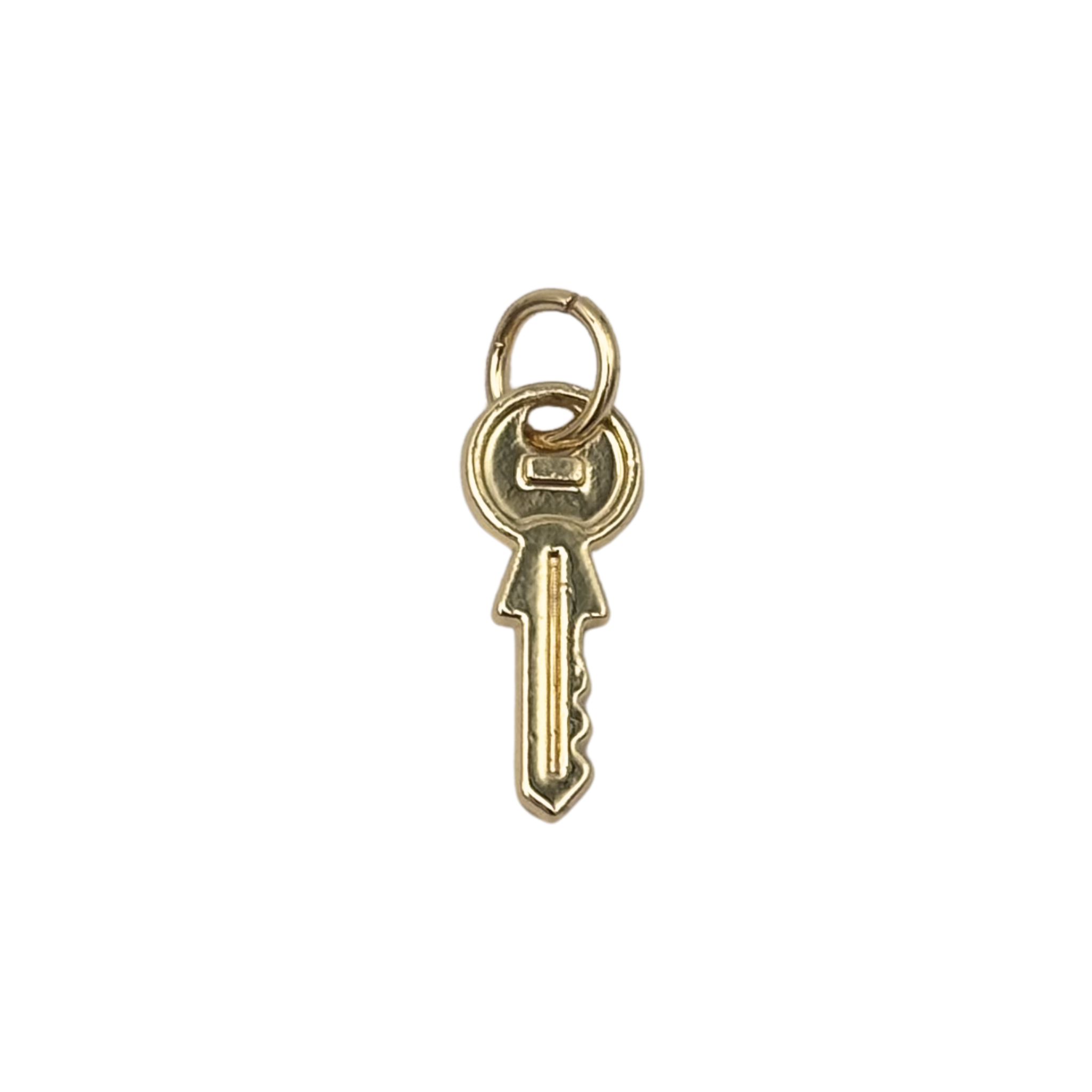 Gold tiny key with ribbed and textured detail by HOLST+LEE