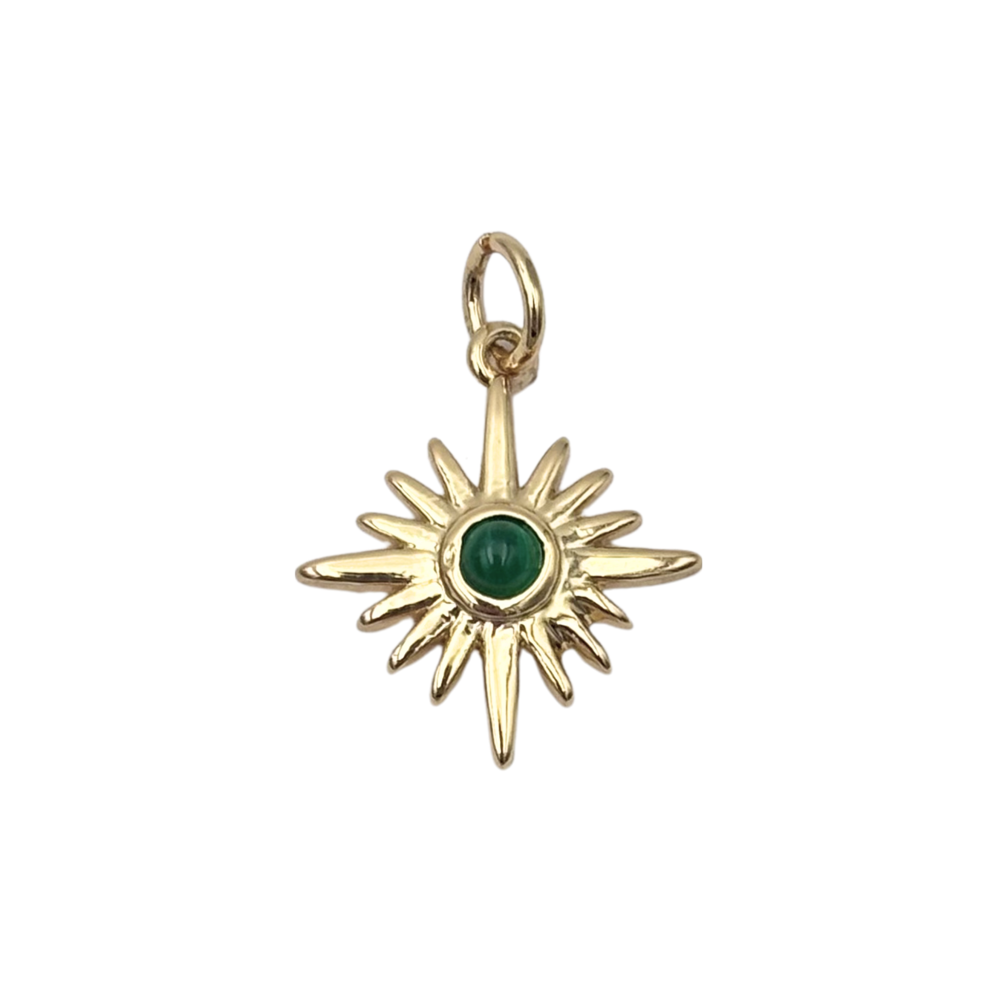 Gold starburst charm with elongated rays, bezel-set green gem center by HOLST+LEE