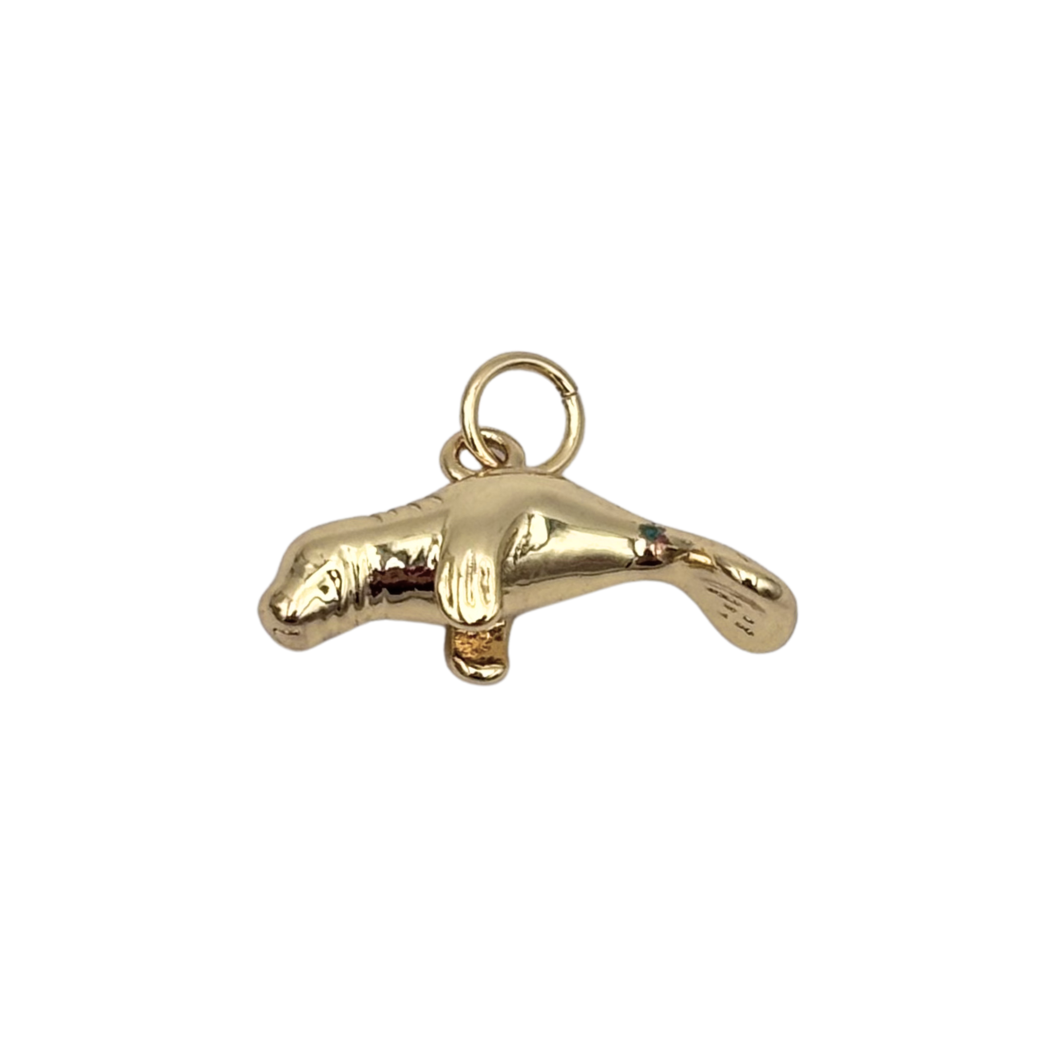 Gold manatee charm with polished rounded body and flipper detail by HOLST+LEE