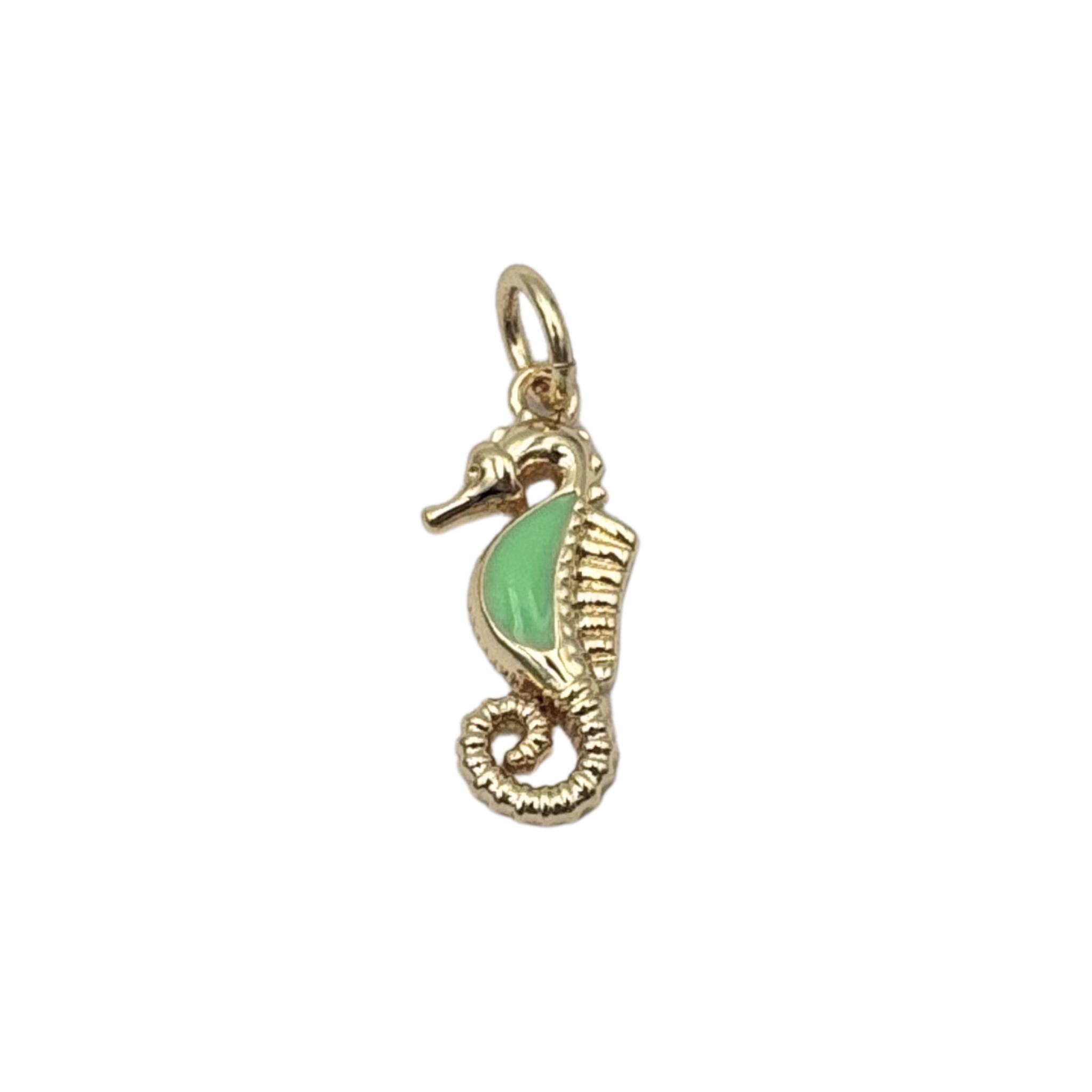 Detailed gold seahorse charm with mint green enamel belly, ridged texture, curled tail by HOLST+LEE