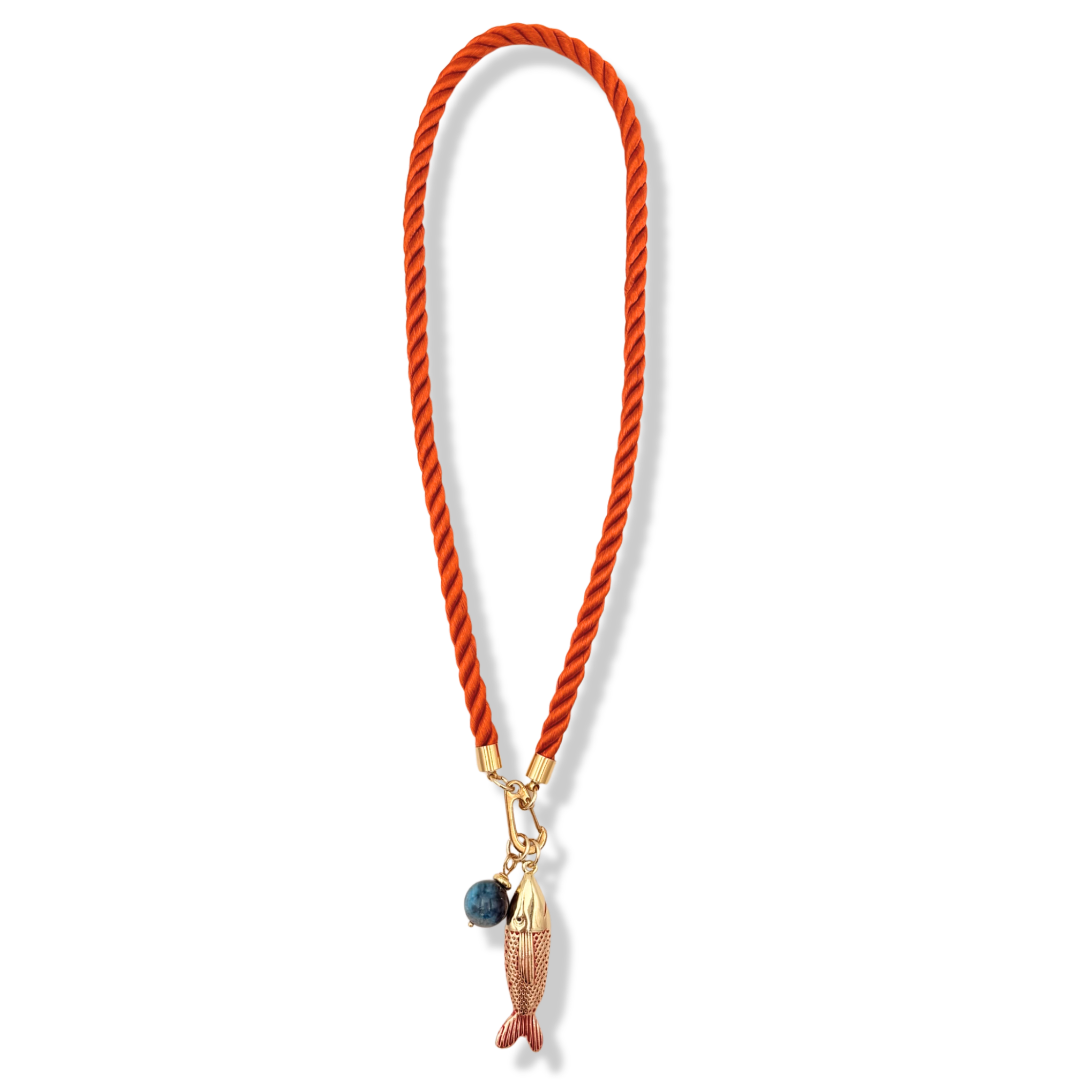 Orange twisted rope necklace with gold fish charm and turquoise stone charm by HOLST+LEE