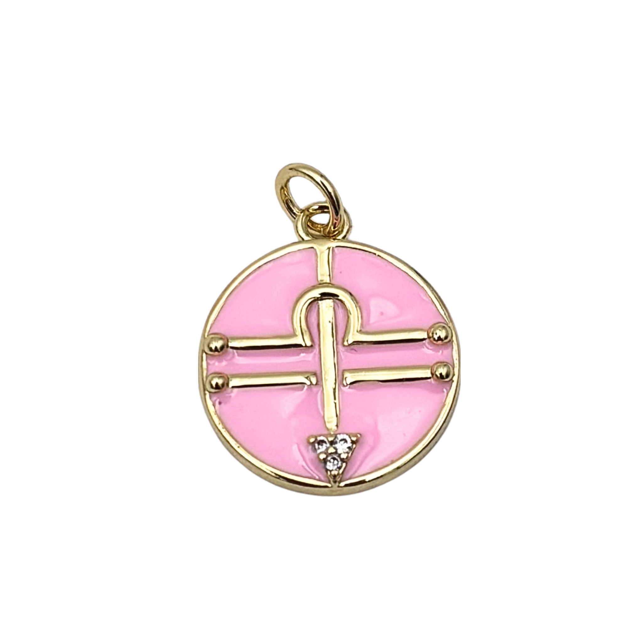 Pisces zodiac charm pendant with pink enamel disc, gold fish symbol, and crystal accent details by HOLST+LEE