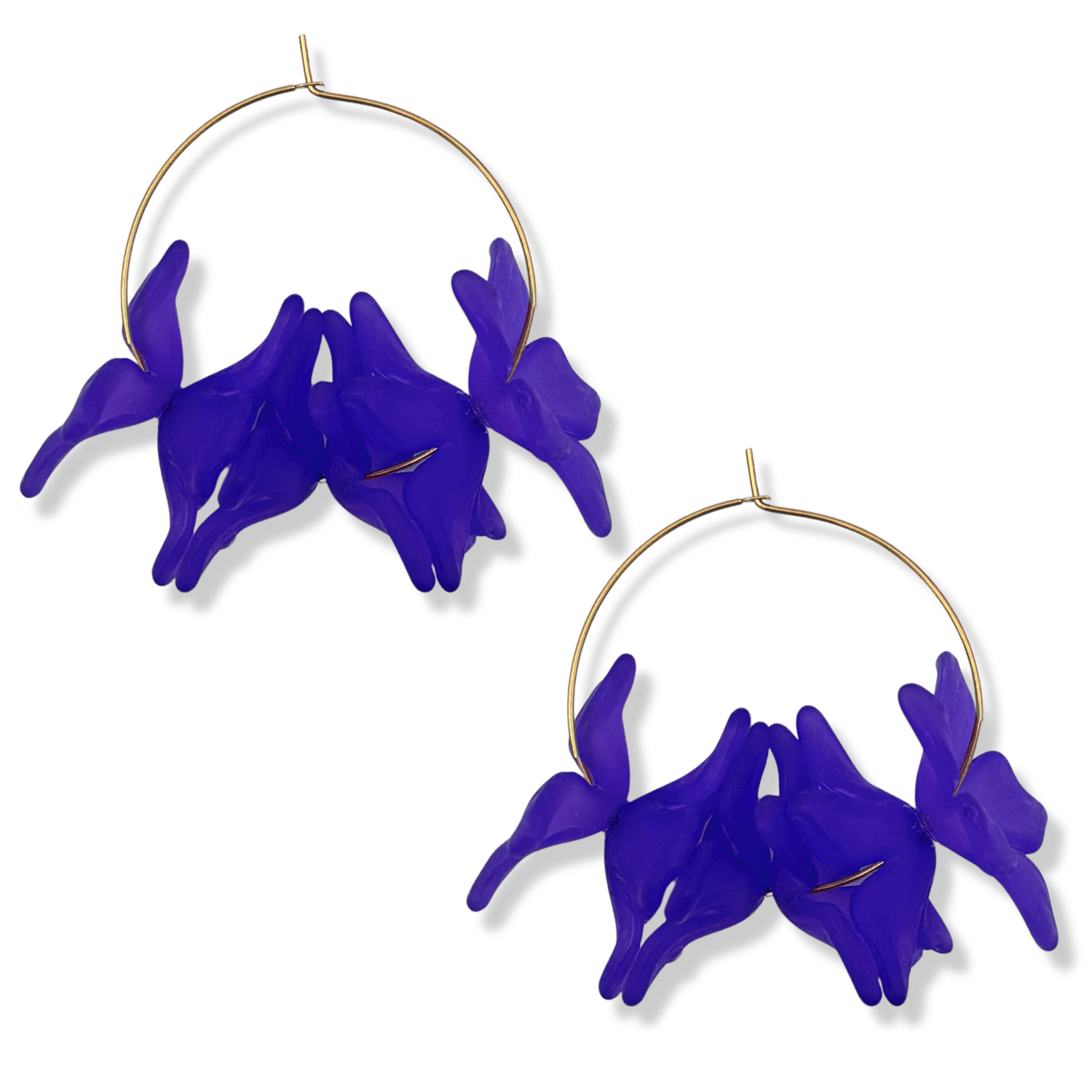 Purple resin floral cluster hoop earrings with translucent purple orchid-style blooms on a thin gold hoop by HOLST+LEE