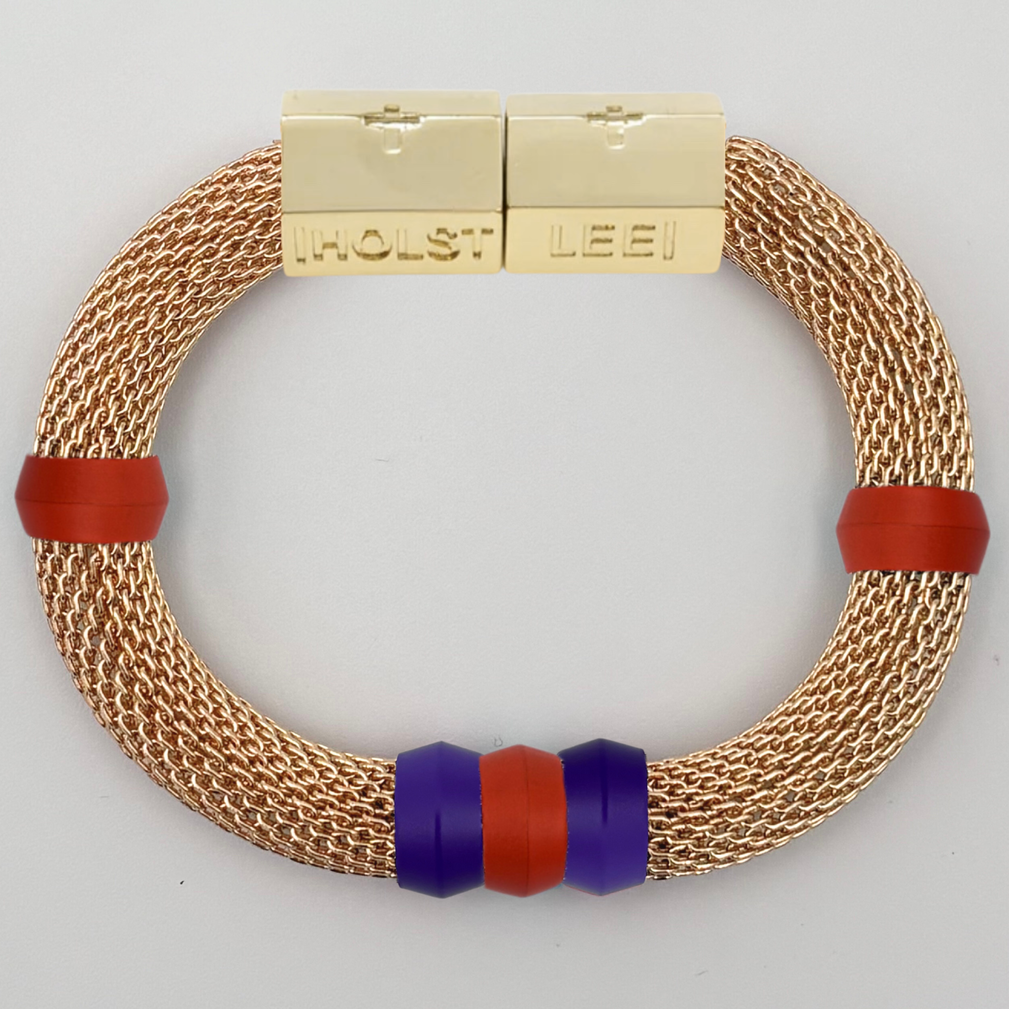 Gold woven mesh bracelet with orange and purple candy ferrule accents and gold magnetic clasped bracelet by HOLST+LEE