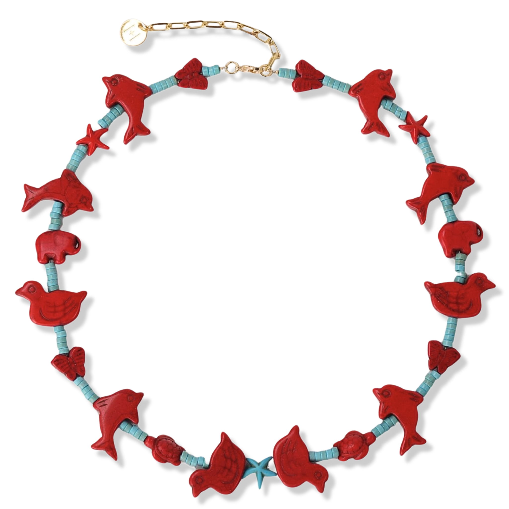 Red carved beaded necklace with turquoise beads and nature-themed animal beads by HOLST+LEE
