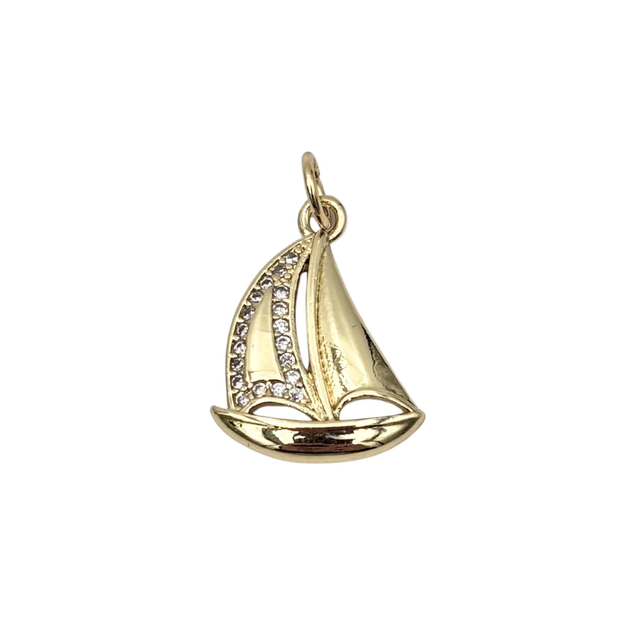 Gold sailboat charm with pavé crystal sail edges and polished hull by HOLST+LEE