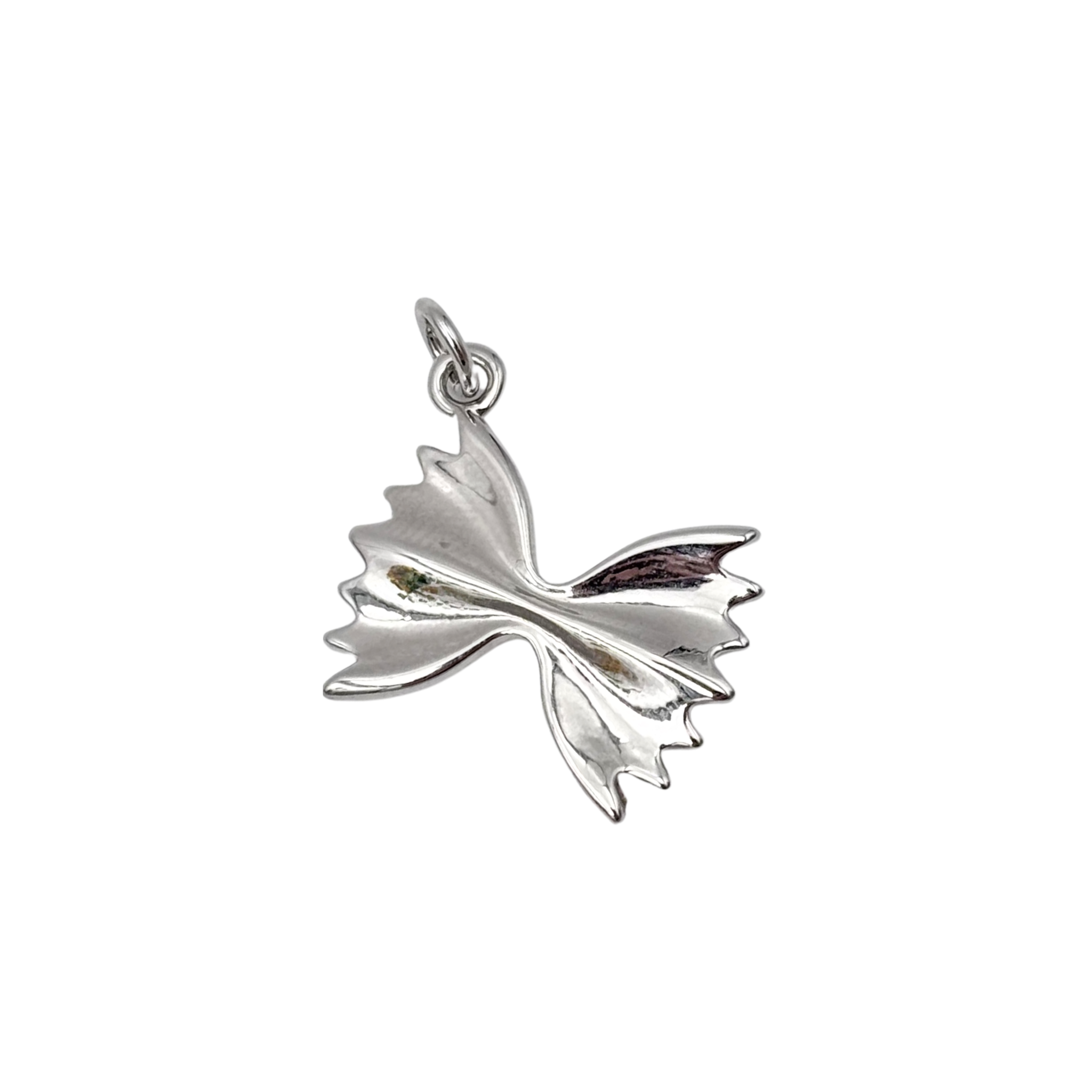 Silver sculpted bowtie pasta charm with ruffled edge detail