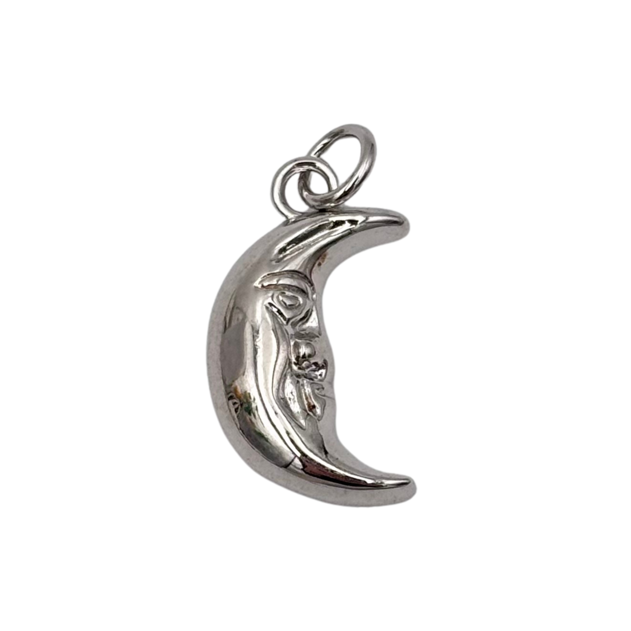 Polished silver crescent moon charm with sculpted human face profile by HOLST+LEE