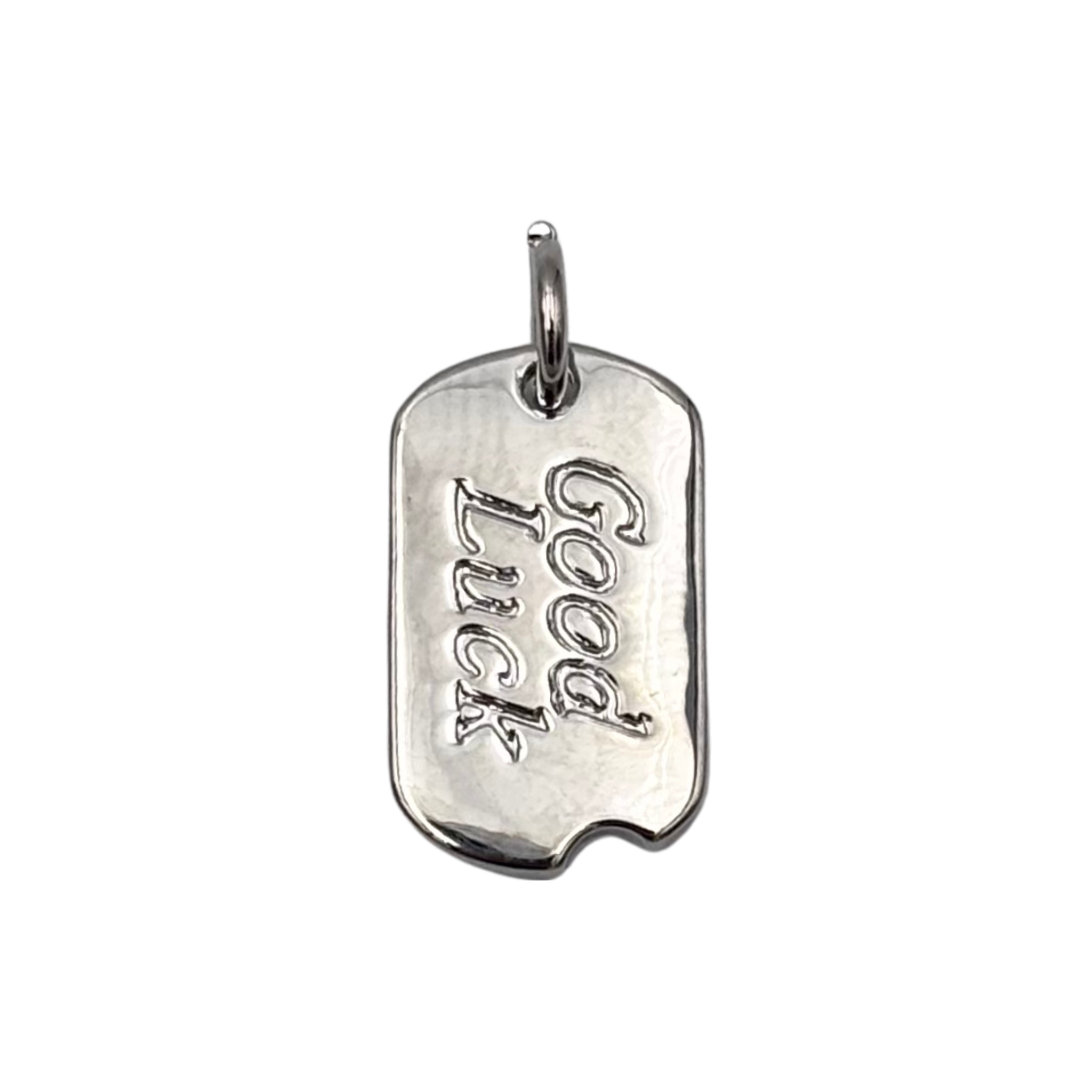 Polished silver rectangular dog tag charm with Good Luck script engraving and rounded corners by HOLST+LEE