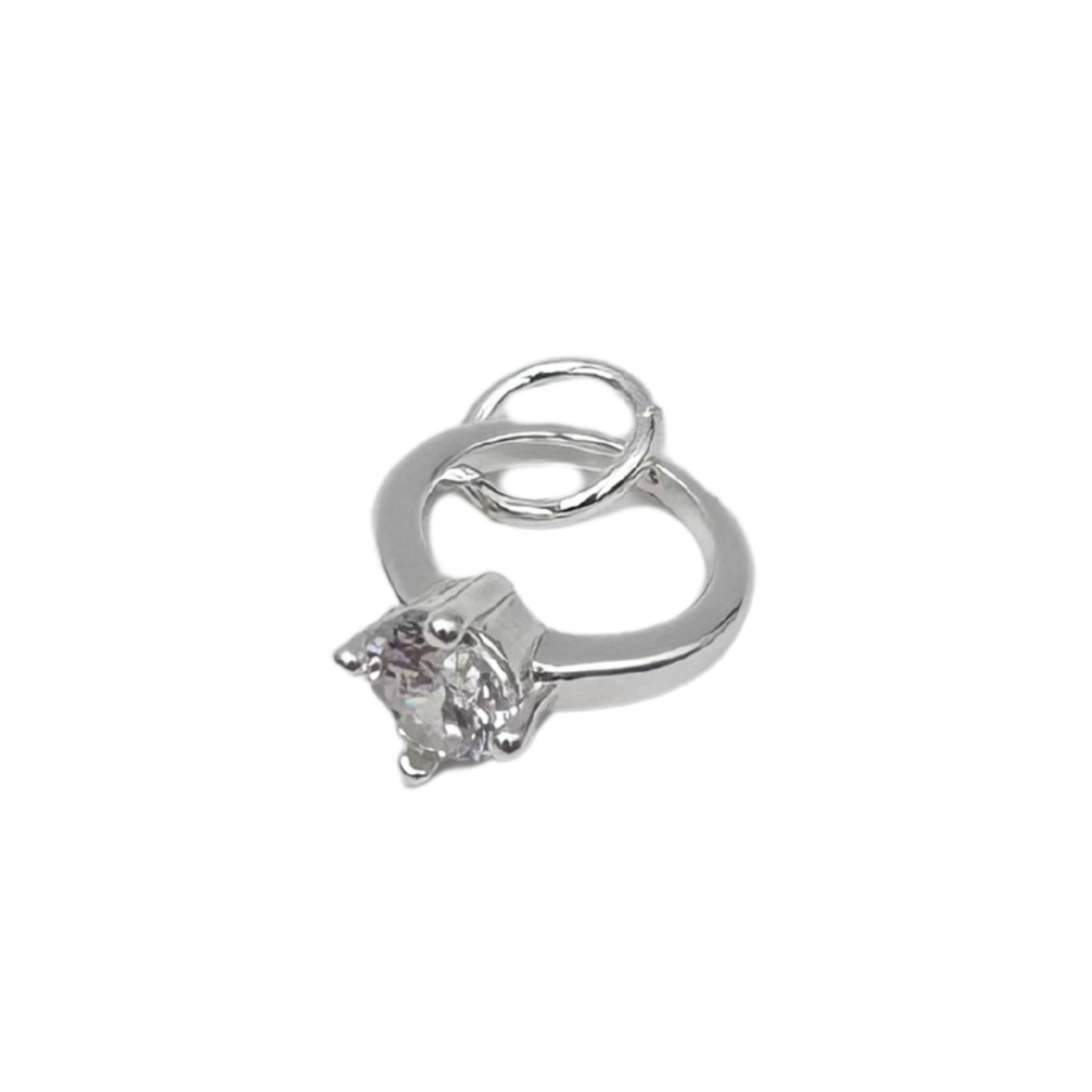 Silver wedding ring with a clear gemstone by HOLST+LEE