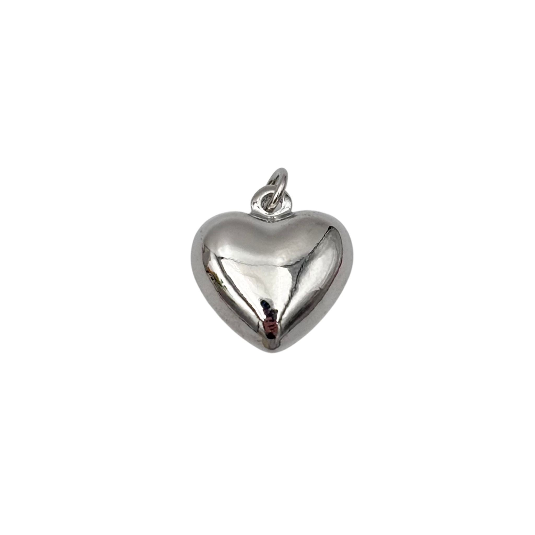 Small silver puffy heart charm pendant with polished finish by HOLST+LEE
