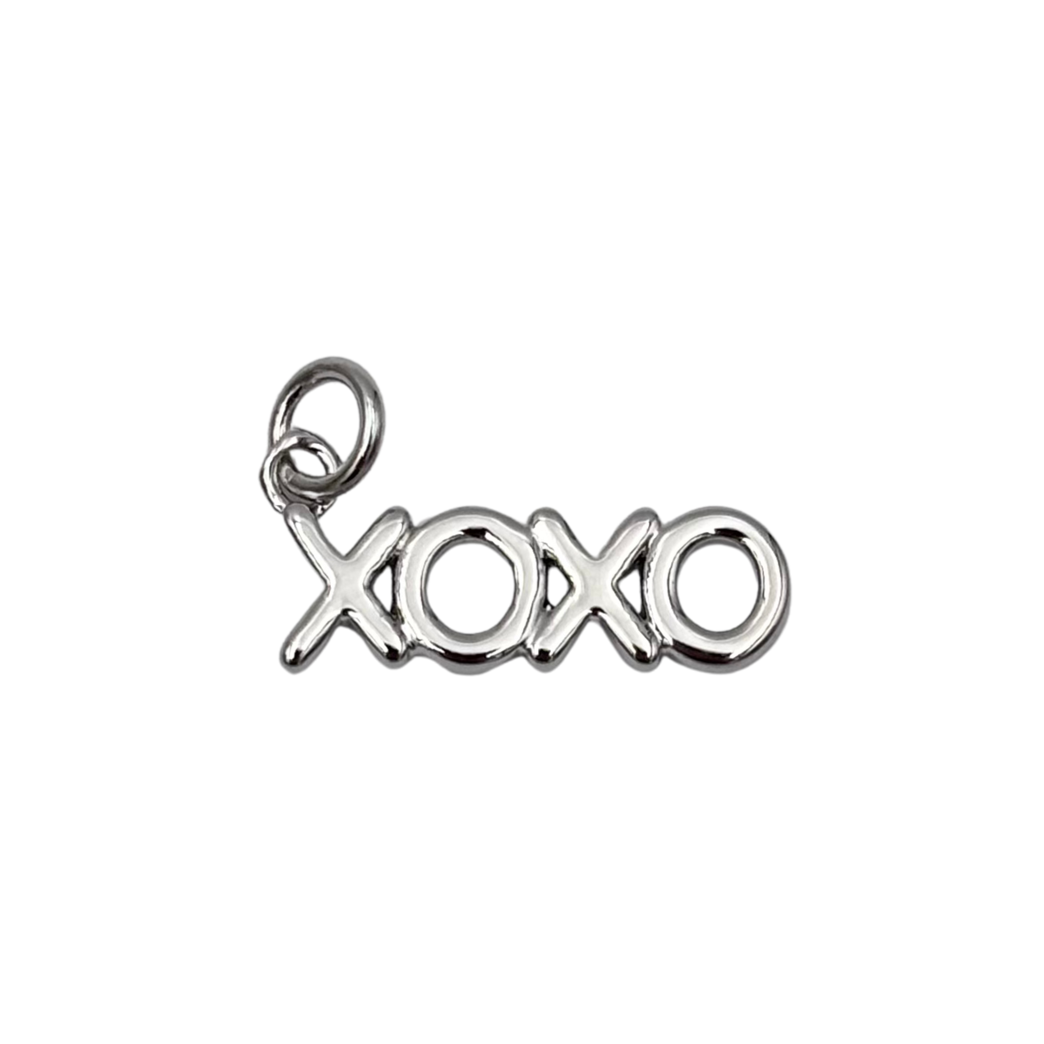 Silver XOXO charm with sleek finish by HOLST+LEE