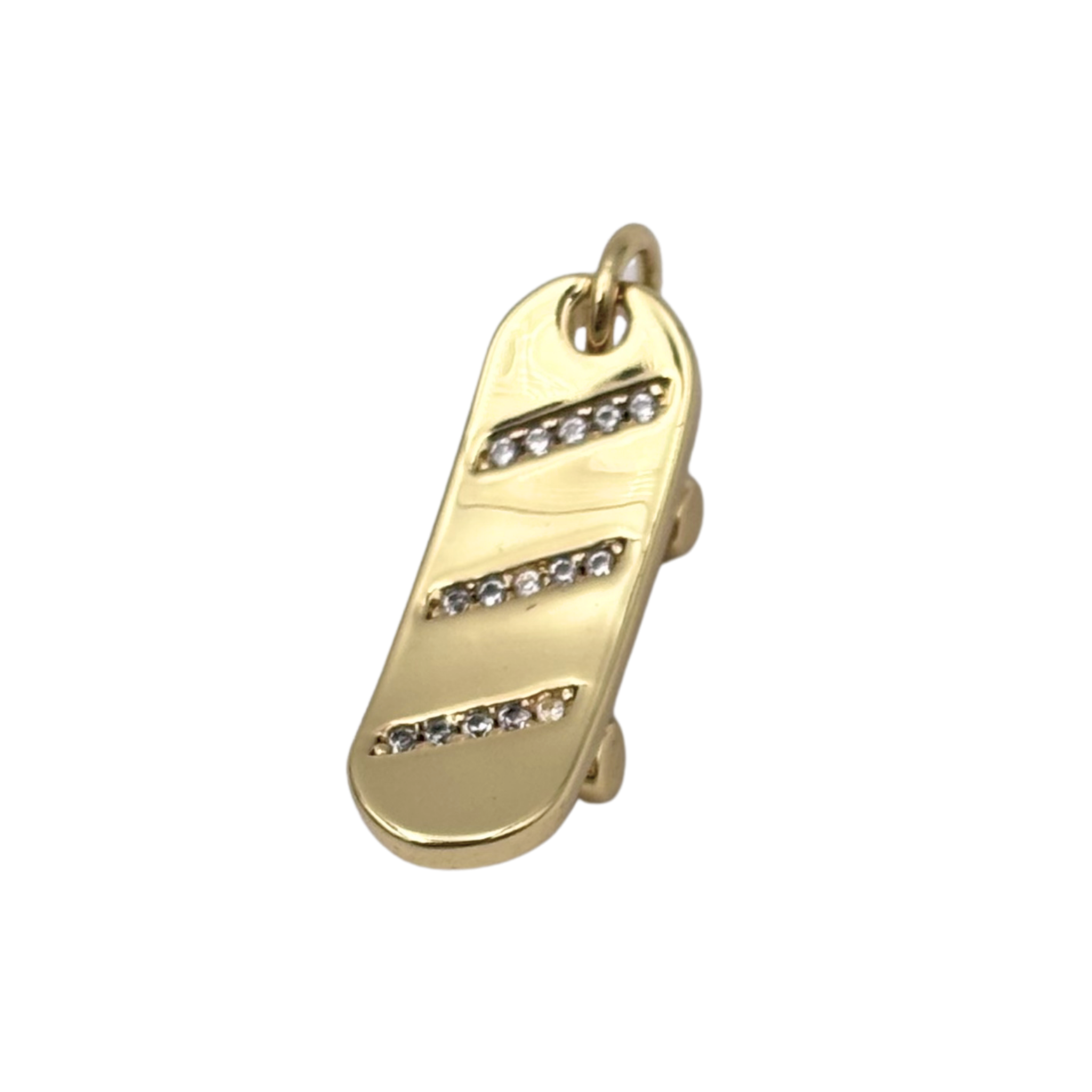 Gold skateboard charm with pavé rhinestone stripes by HOLST+LEE