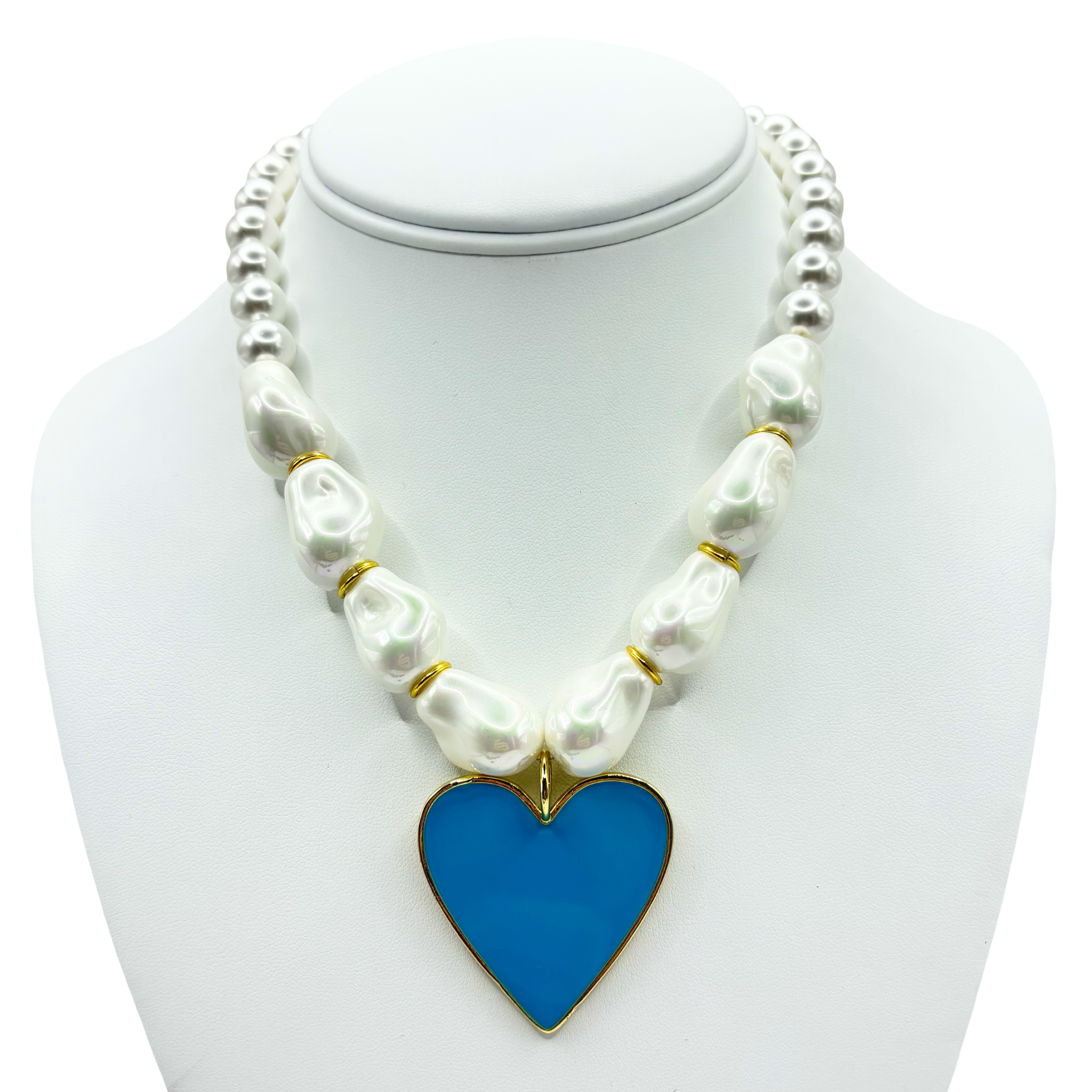 Faux pearl necklace with a sky blue heart pendant with gold accents by HOLST+LEE
