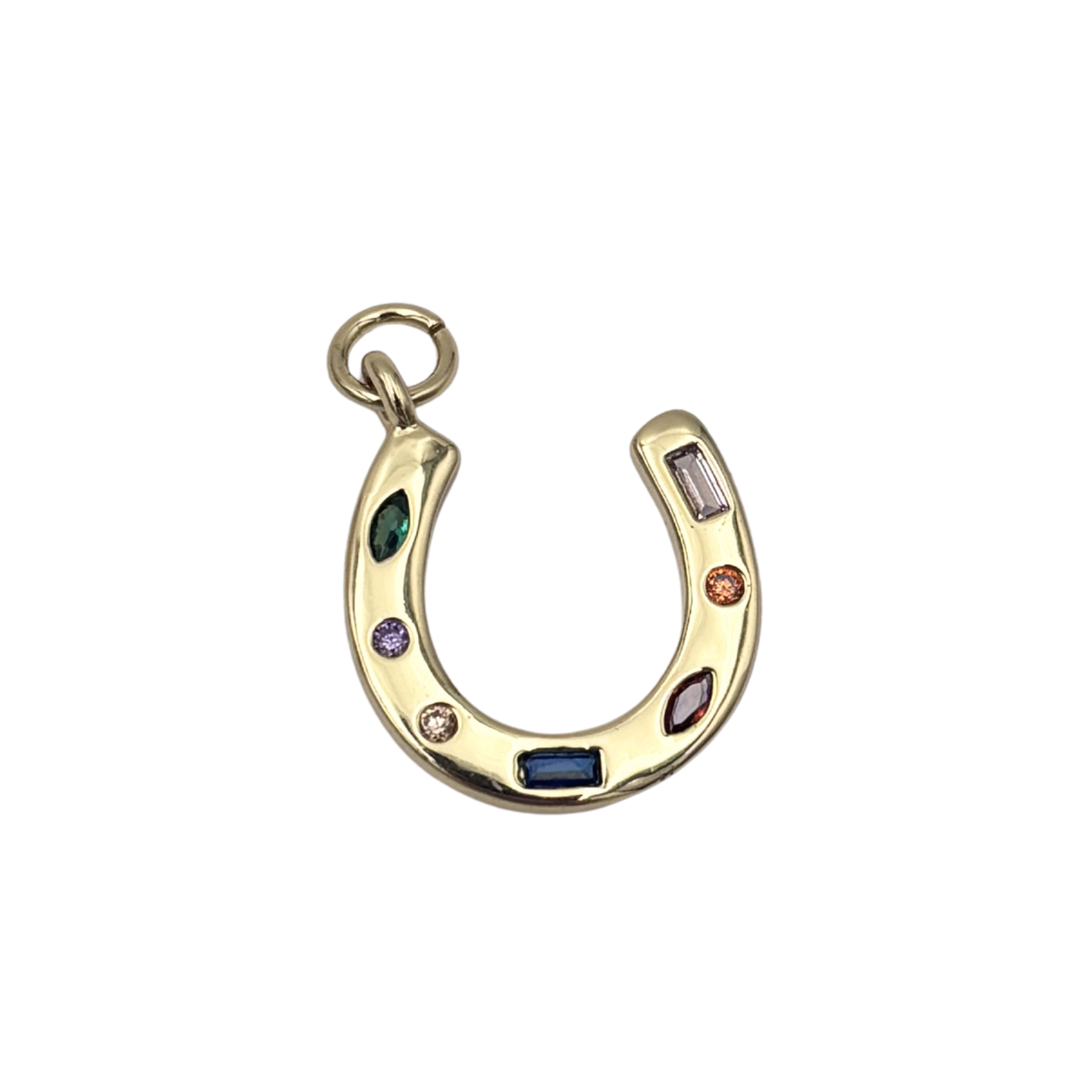 Small gold horseshoe charm with mixed gemstone settings including ruby, amethyst, emerald, and clear rhinestones by HOLST+LEE