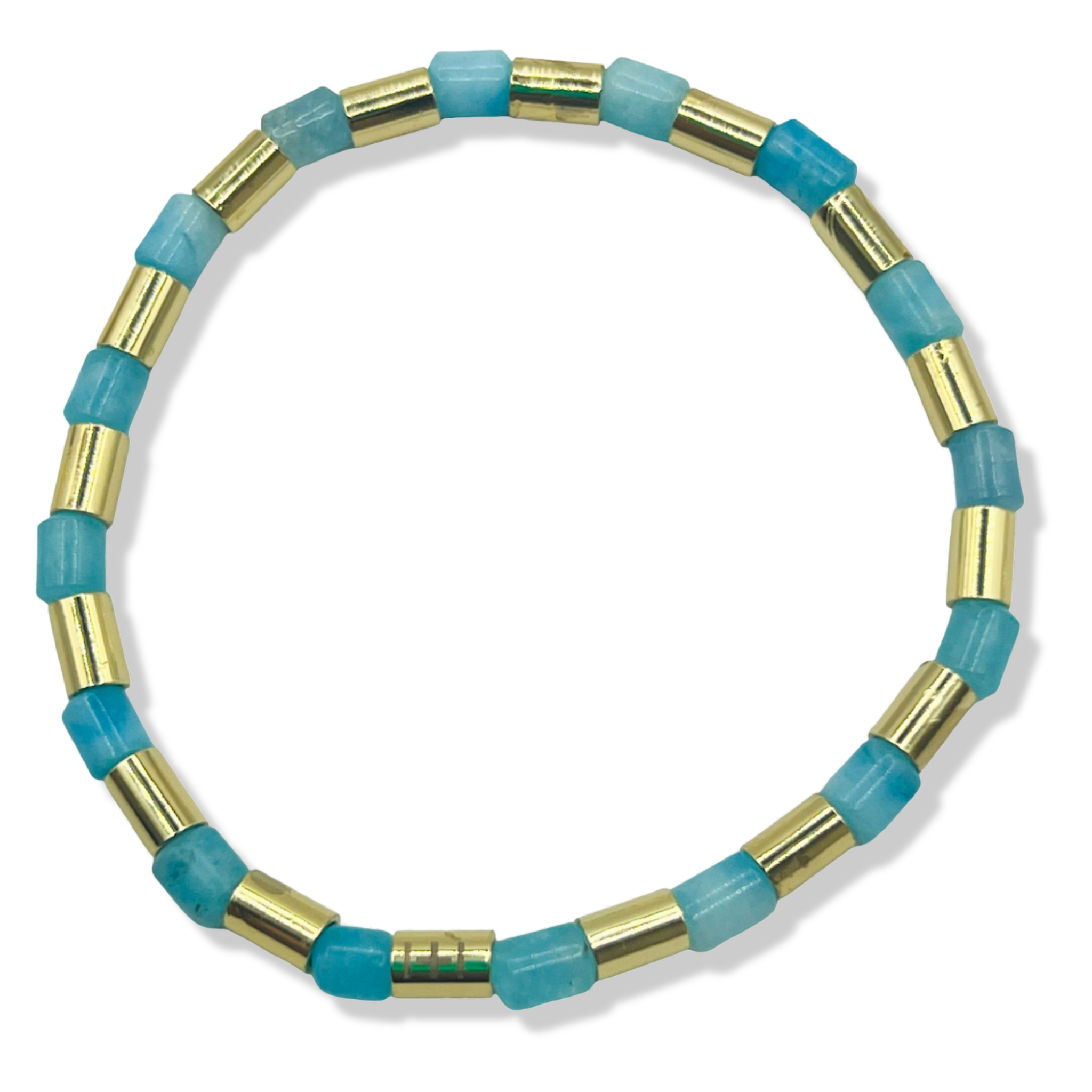 Bracelet with blue topaz and gold cylindrical beads by HOLST+LEE