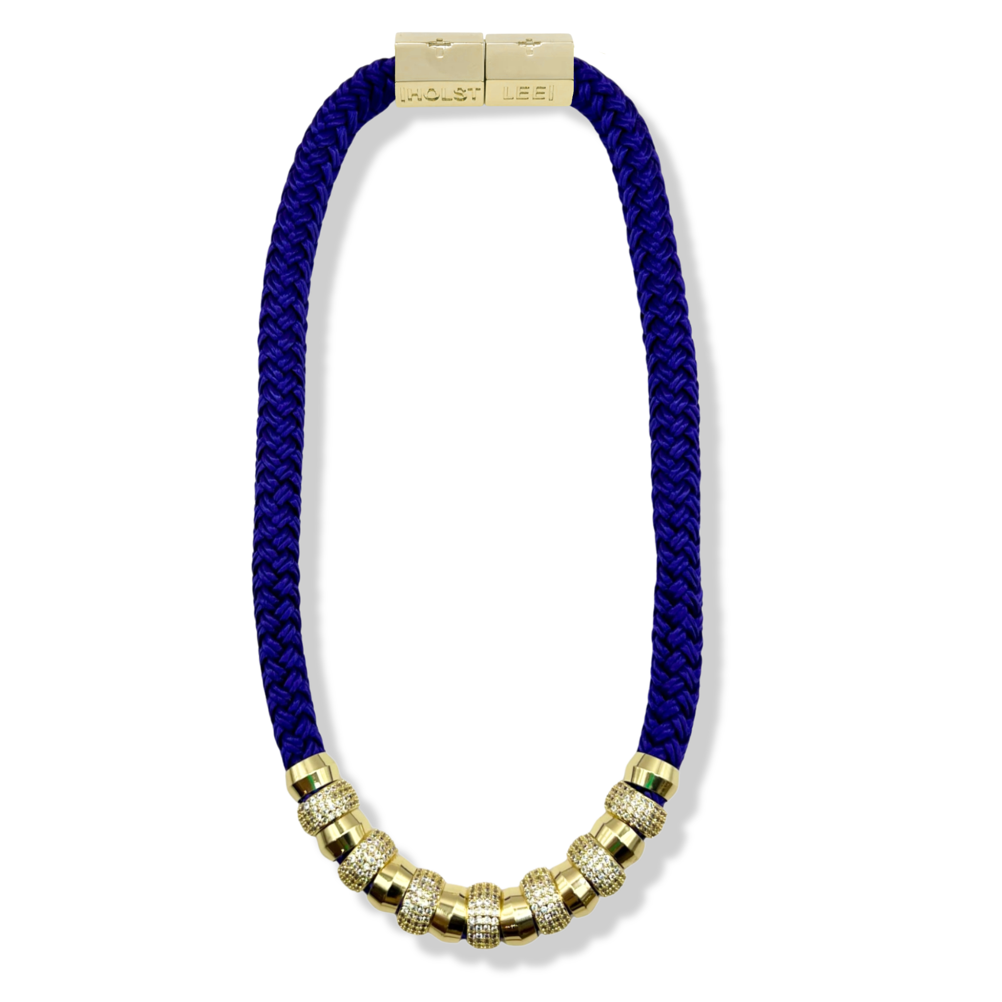 Purple braided rope necklace with pavé crystal and gold ferrule stack and gold magnetic clasped necklace by HOLST+LEE