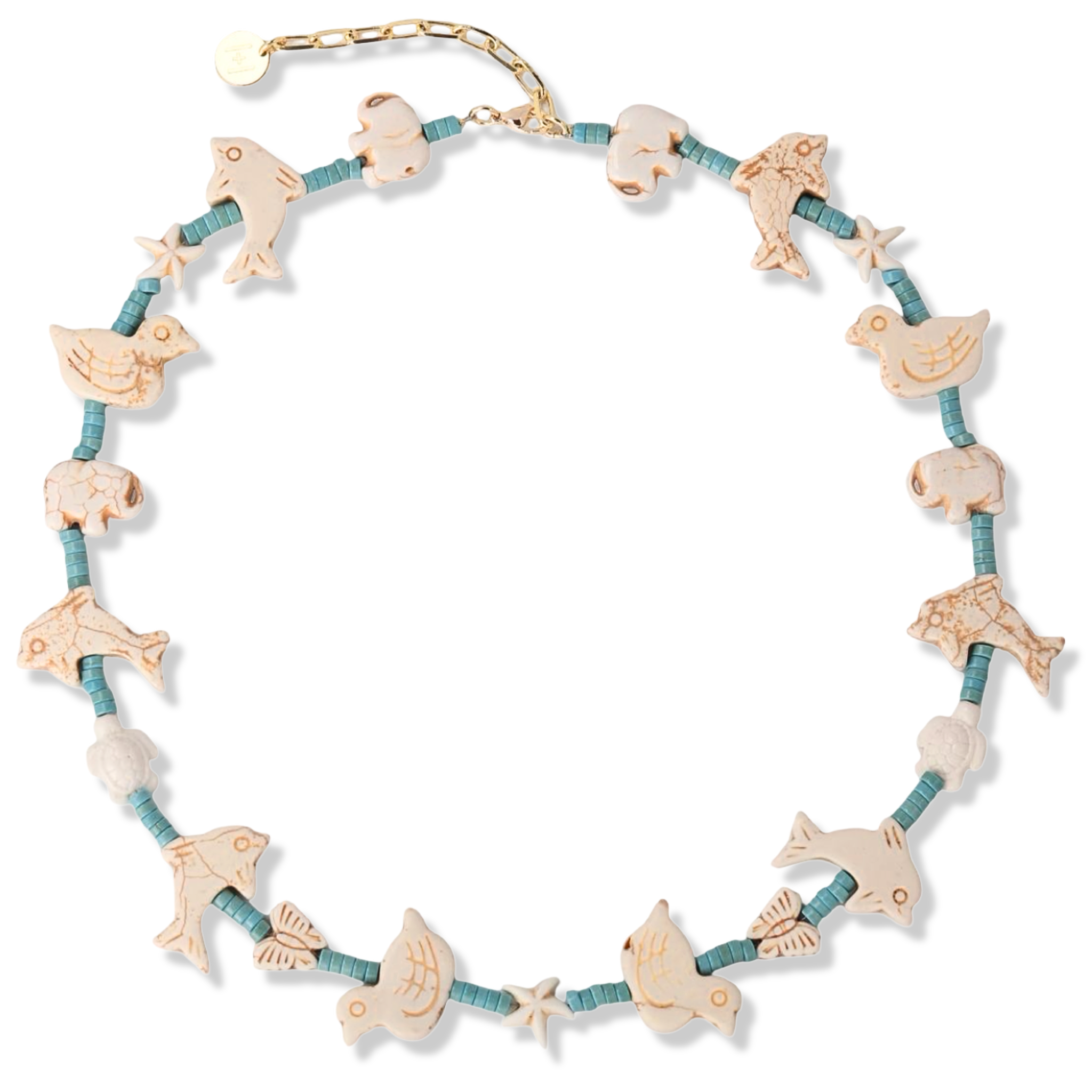 White carved beaded necklace with turquoise beads and nature-themed animal beads by HOLST+LEE