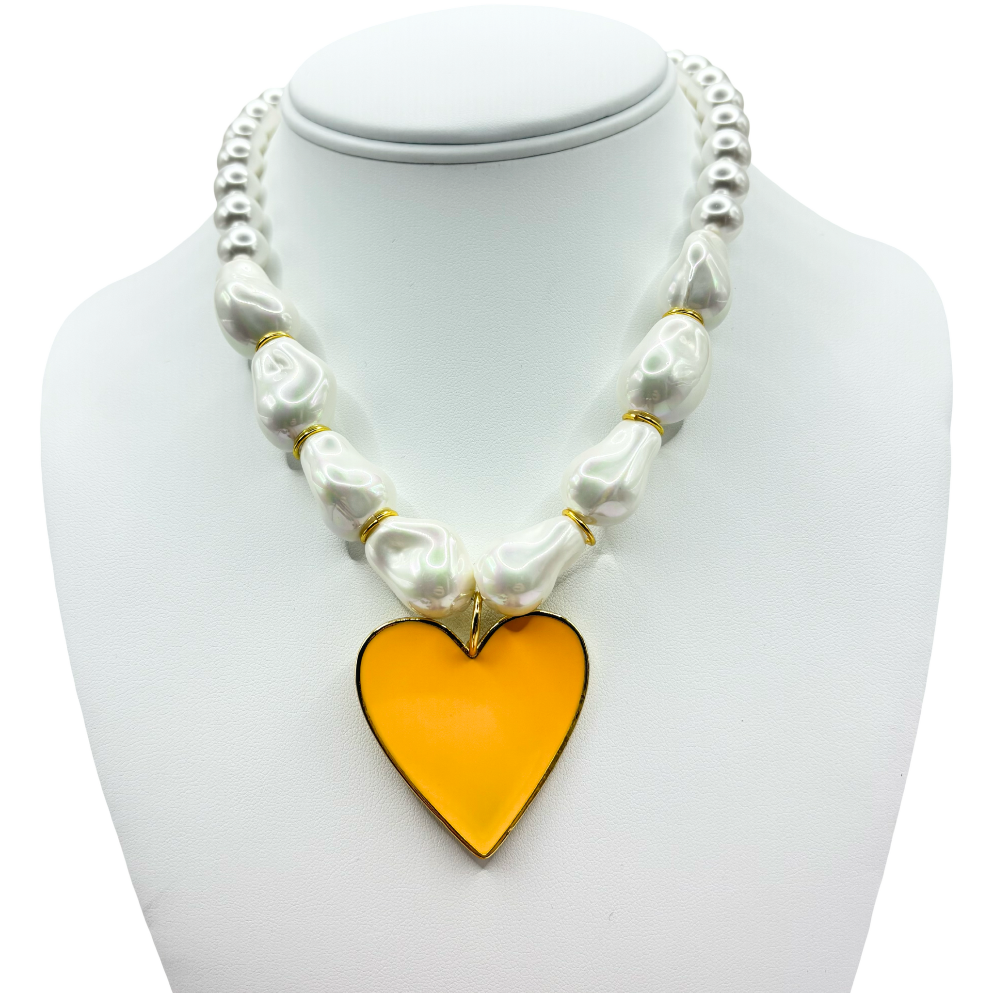 Faux pearl necklace with a yellow heart pendant with gold accents by HOLST+LEE